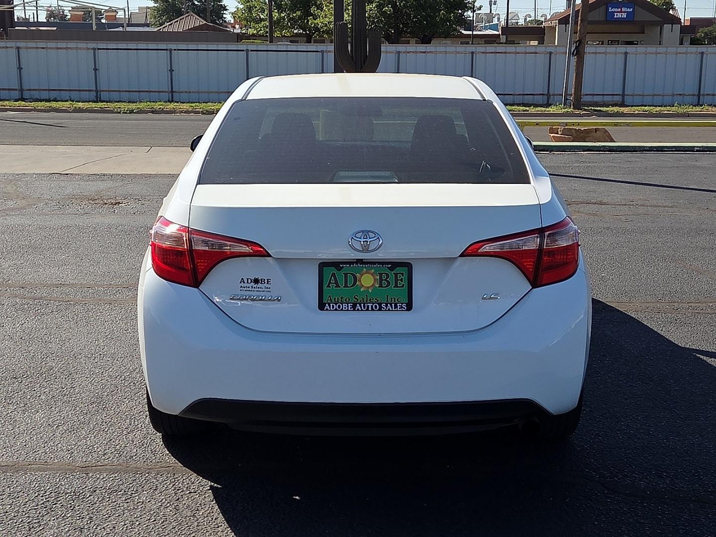 2019 Super White - 040 /Black - 21 Toyota Corolla LE (2T1BURHE5KC) with an 1.8L I-4 DOHC, VVT-i variable valve control, regular gasoline, engine with 132HP engine, located at 4711 Ave Q, Lubbock, TX, 79412, (806) 687-2362, 33.551304, -101.855293- Photo#3