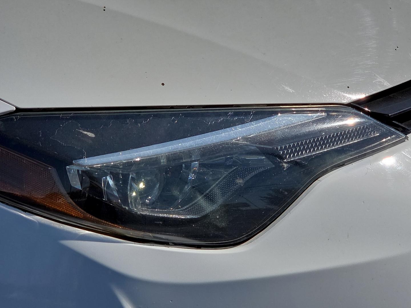 2019 Super White - 040 /Black - 21 Toyota Corolla LE (2T1BURHE5KC) with an 1.8L I-4 DOHC, VVT-i variable valve control, regular gasoline, engine with 132HP engine, located at 4711 Ave Q, Lubbock, TX, 79412, (806) 687-2362, 33.551304, -101.855293- Photo#8
