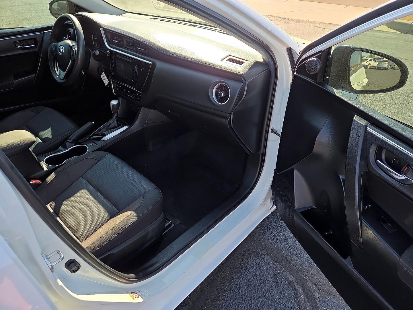 2019 Super White - 040 /Black - 21 Toyota Corolla LE (2T1BURHE5KC) with an 1.8L I-4 DOHC, VVT-i variable valve control, regular gasoline, engine with 132HP engine, located at 4711 Ave Q, Lubbock, TX, 79412, (806) 687-2362, 33.551304, -101.855293- Photo#10