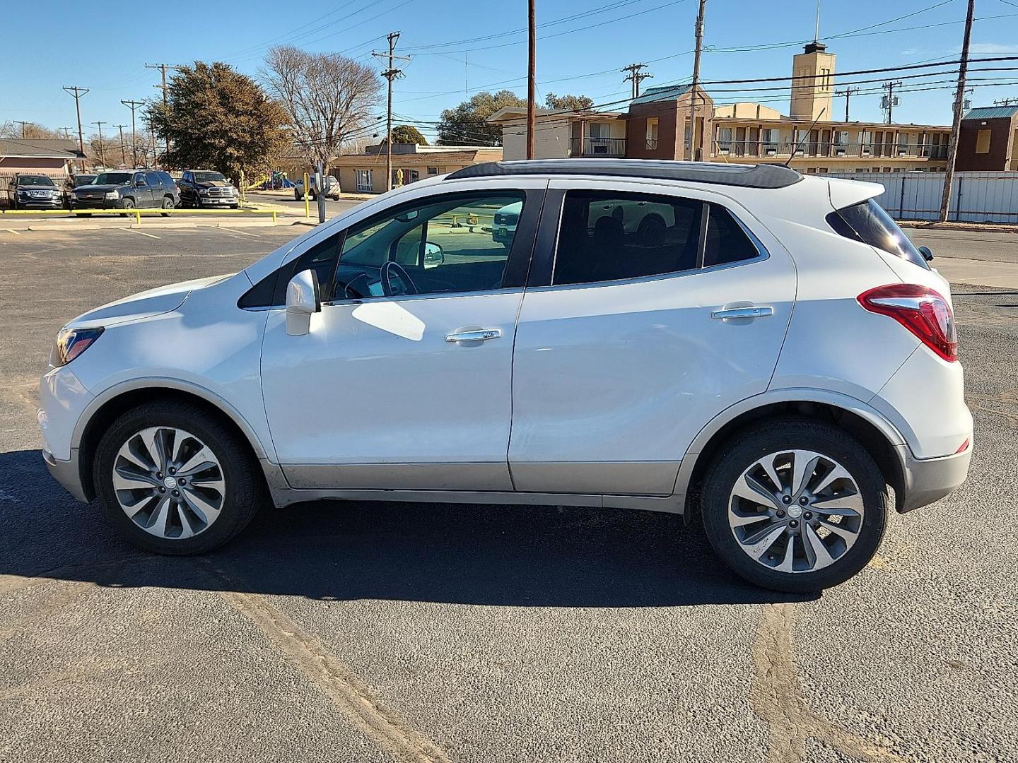2020 WHITE Buick Encore FWD Preferred (KL4CJASB9LB) with an ECOTEC 1.4L I-4 DOHC, variable valve control, intercooled turbo, regular unleaded, engine with 138HP engine, located at 4711 Ave Q, Lubbock, TX, 79412, (806) 687-2362, 33.551304, -101.855293 - Photo#1