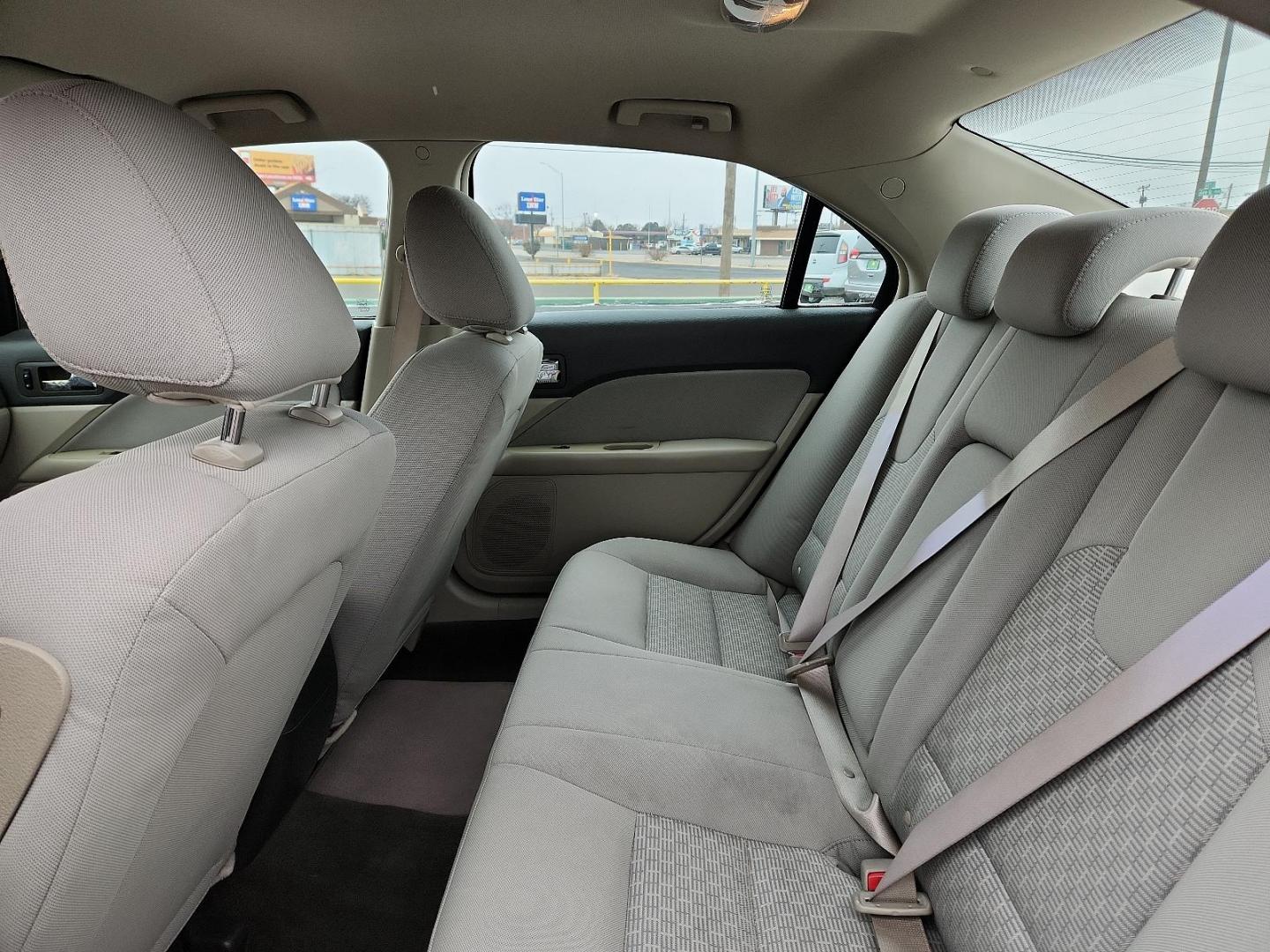 2010 WHITE Ford Fusion S (3FAHP0GA5AR) with an 2.5L 16V I4 DURATEC ENGINE engine, located at 4711 Ave Q, Lubbock, TX, 79412, (806) 687-2362, 33.551304, -101.855293 - Photo#8