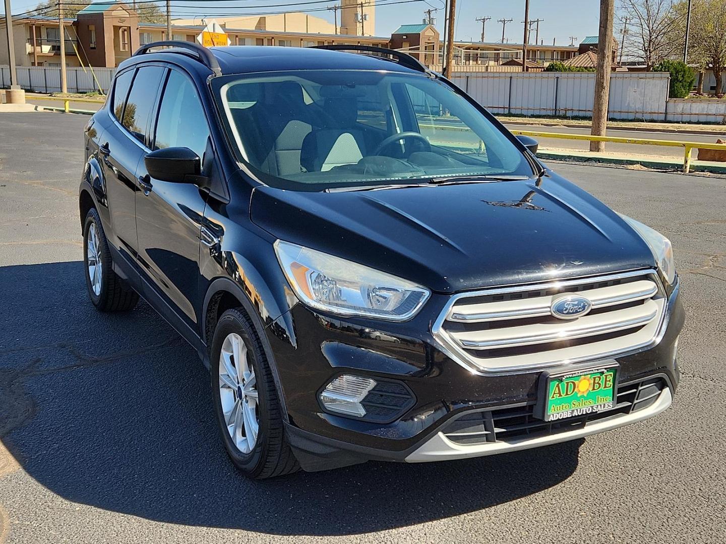 2018 BLACK Ford Escape SE (1FMCU0GD8JU) with an ENGINE: 1.5L ECOBOOST engine, located at 4711 Ave Q, Lubbock, TX, 79412, (806) 687-2362, 33.551304, -101.855293 - Photo#5