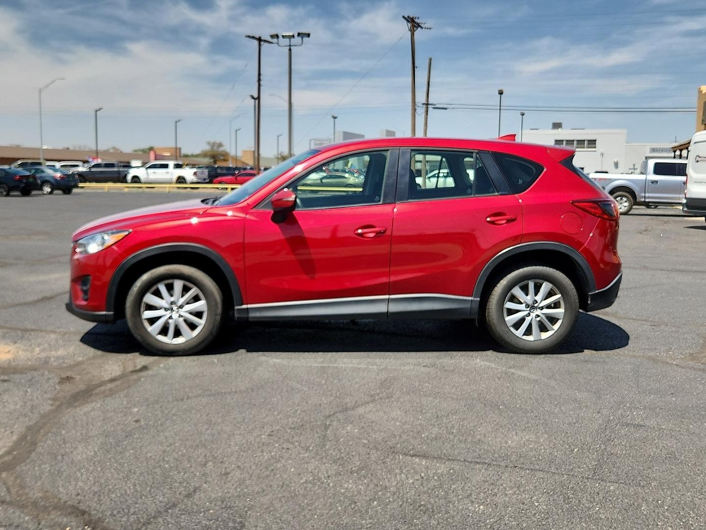 2016 RED /Black - KC3 Mazda CX-5 Sport (JM3KE2BY4G0) with an SKYACTIV-G 2.5L I-4 gasoline direct injection, DOHC, variable valve control, regular unleaded, engine with 184HP engine, located at 4711 Ave Q, Lubbock, TX, 79412, (806) 687-2362, 33.551304, -101.855293- Photo#1