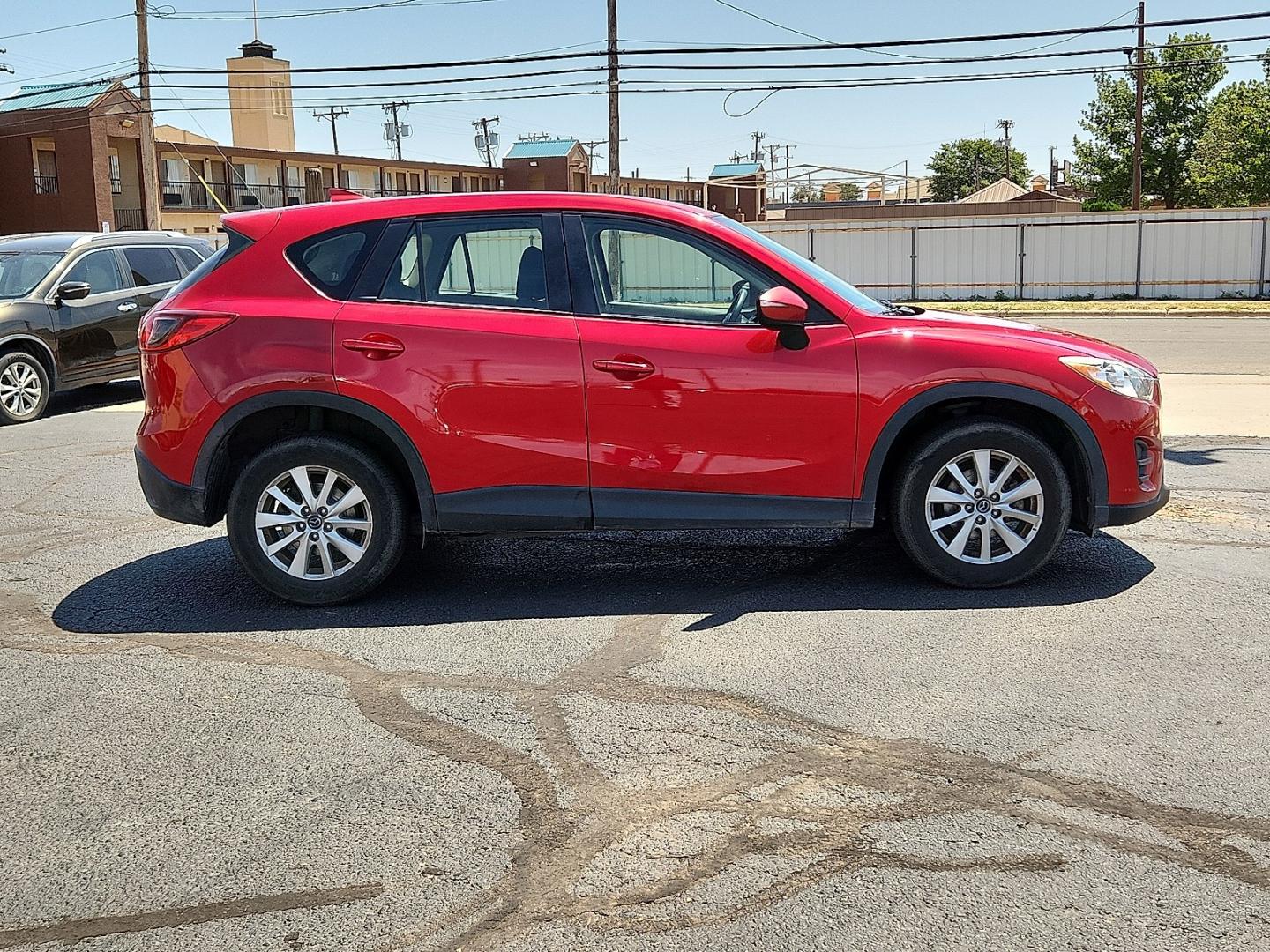 2016 RED /Black - KC3 Mazda CX-5 Sport (JM3KE2BY4G0) with an SKYACTIV-G 2.5L I-4 gasoline direct injection, DOHC, variable valve control, regular unleaded, engine with 184HP engine, located at 4711 Ave Q, Lubbock, TX, 79412, (806) 687-2362, 33.551304, -101.855293- Photo#4