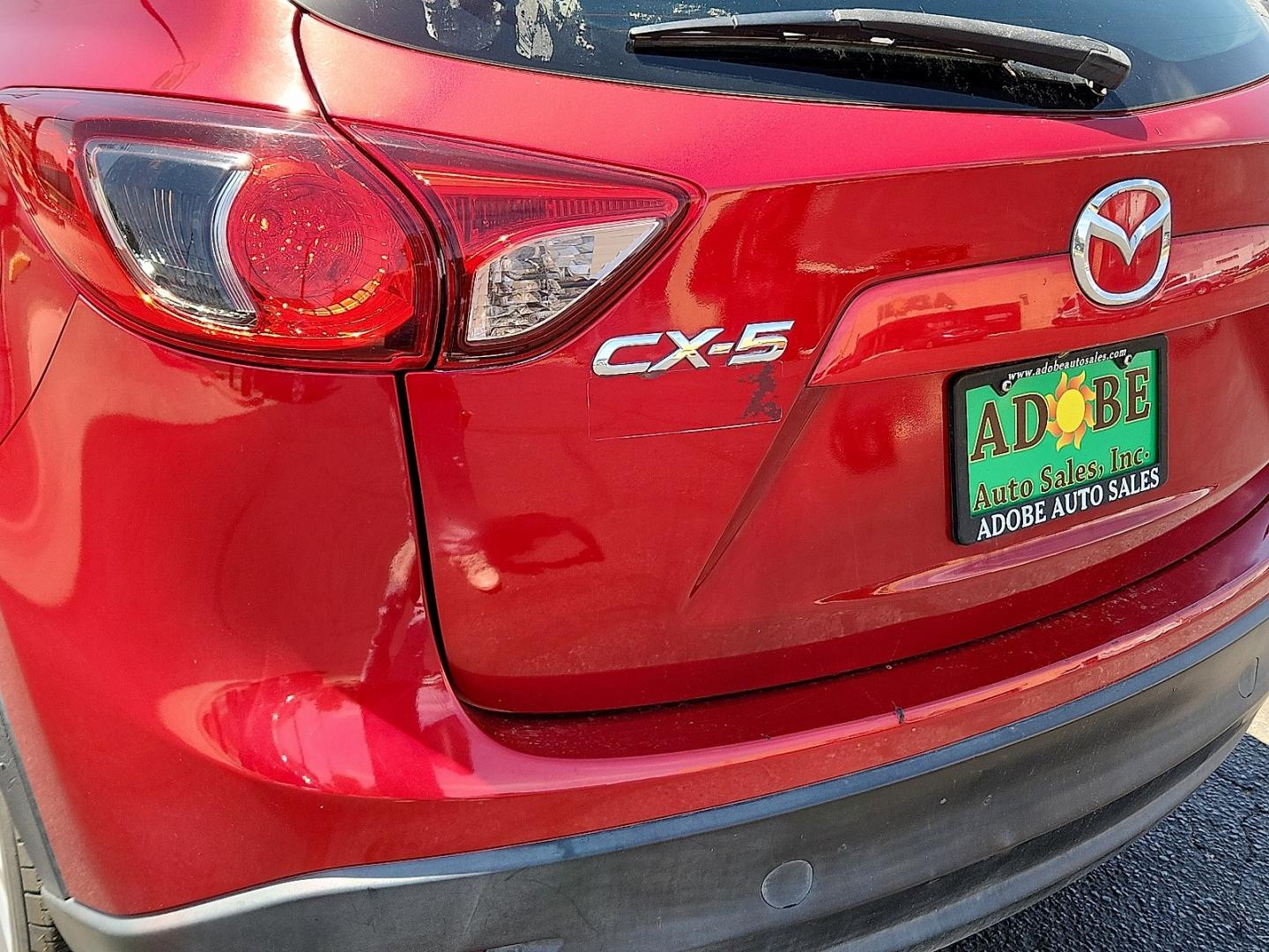 2016 RED /Black - KC3 Mazda CX-5 Sport (JM3KE2BY4G0) with an SKYACTIV-G 2.5L I-4 gasoline direct injection, DOHC, variable valve control, regular unleaded, engine with 184HP engine, located at 4711 Ave Q, Lubbock, TX, 79412, (806) 687-2362, 33.551304, -101.855293- Photo#8