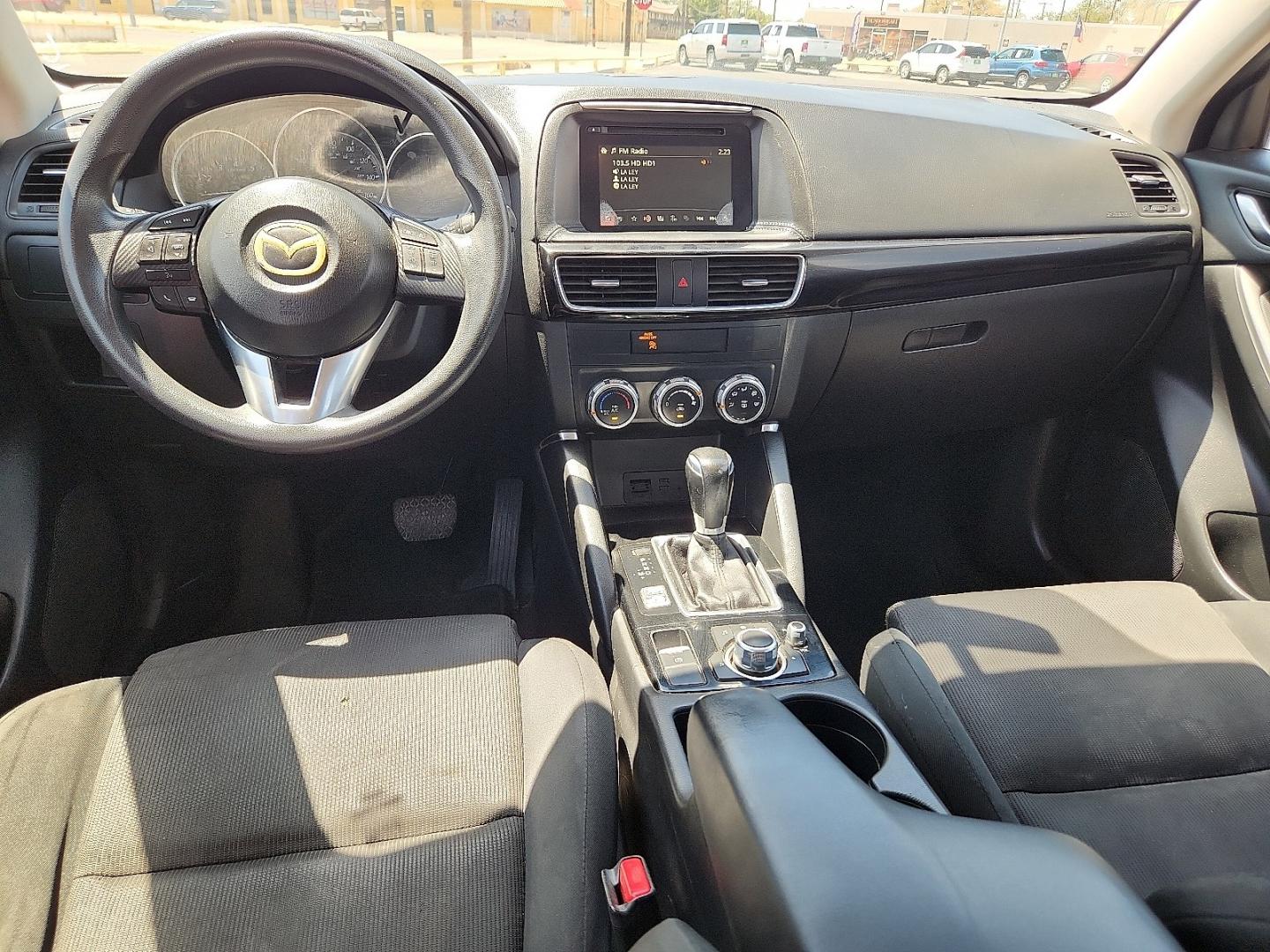 2016 RED /Black - KC3 Mazda CX-5 Sport (JM3KE2BY4G0) with an SKYACTIV-G 2.5L I-4 gasoline direct injection, DOHC, variable valve control, regular unleaded, engine with 184HP engine, located at 4711 Ave Q, Lubbock, TX, 79412, (806) 687-2362, 33.551304, -101.855293- Photo#14