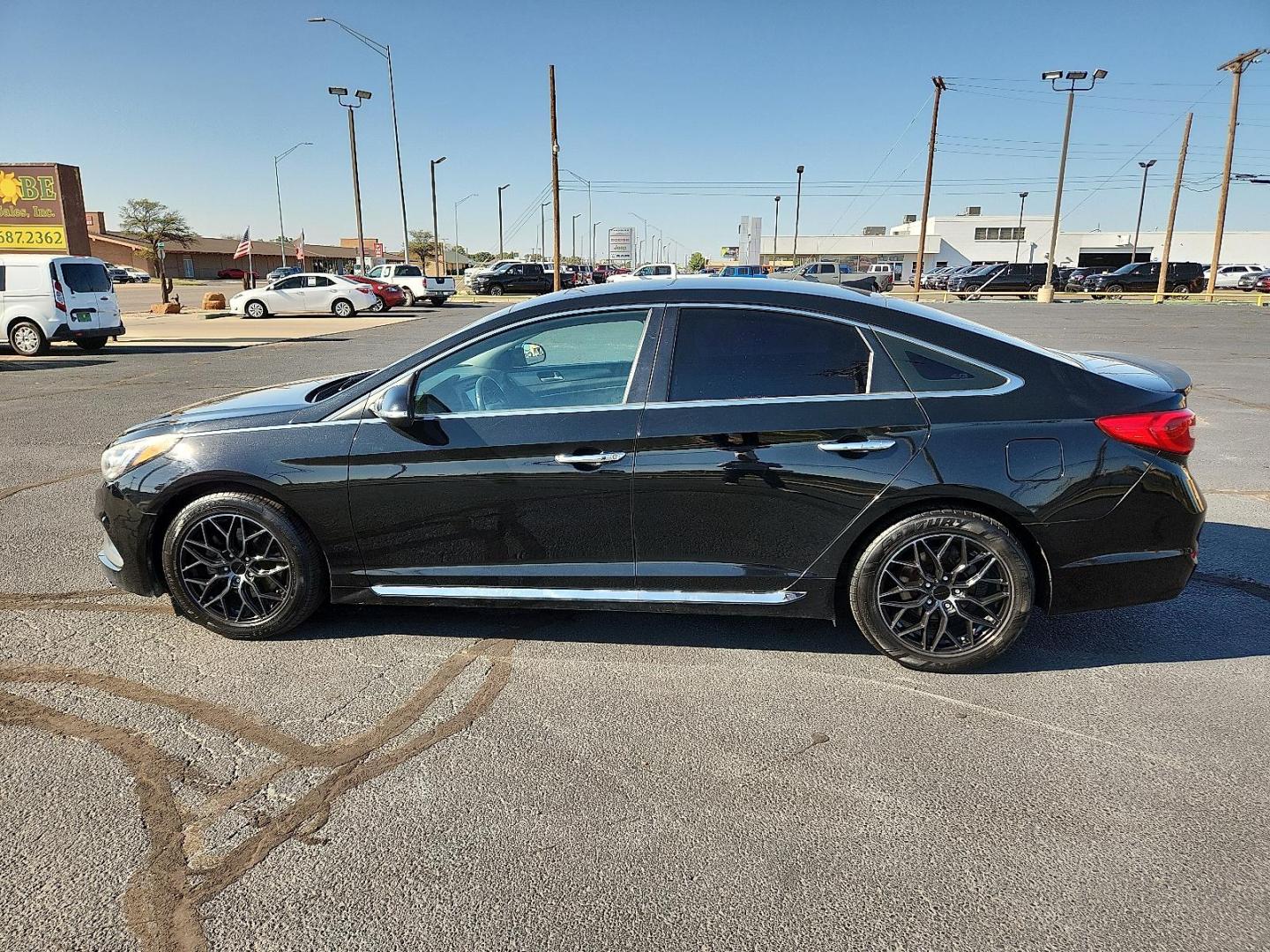 2017 BLACK Hyundai Sonata Sport (5NPE34AF9HH) with an 2.4L I-4 gasoline direct injection, DOHC, D-CVVT variable valve control, regular unleaded, engine with 185HP engine, located at 4711 Ave Q, Lubbock, TX, 79412, (806) 687-2362, 33.551304, -101.855293 - Photo#1