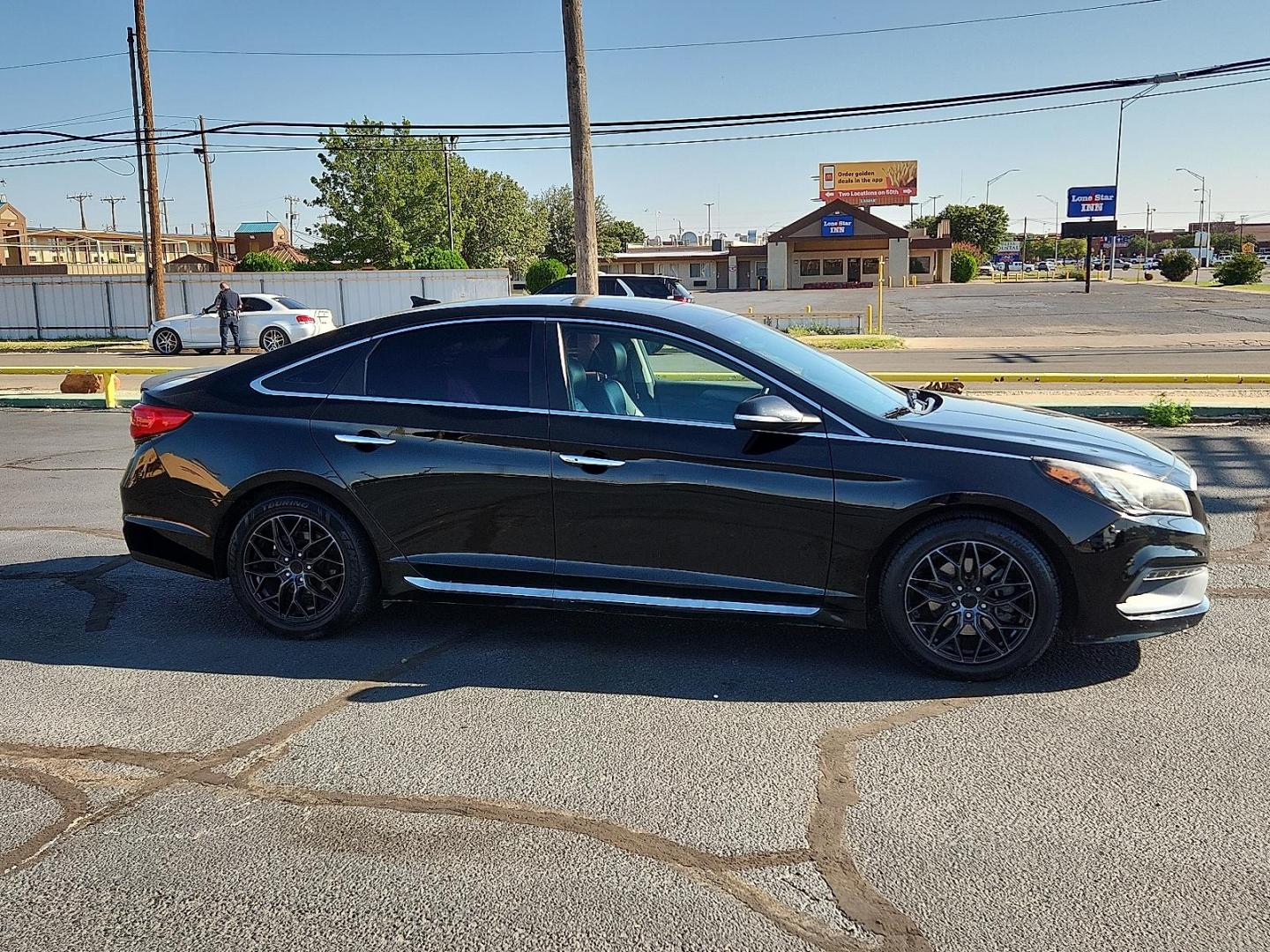 2017 BLACK Hyundai Sonata Sport (5NPE34AF9HH) with an 2.4L I-4 gasoline direct injection, DOHC, D-CVVT variable valve control, regular unleaded, engine with 185HP engine, located at 4711 Ave Q, Lubbock, TX, 79412, (806) 687-2362, 33.551304, -101.855293 - Photo#4