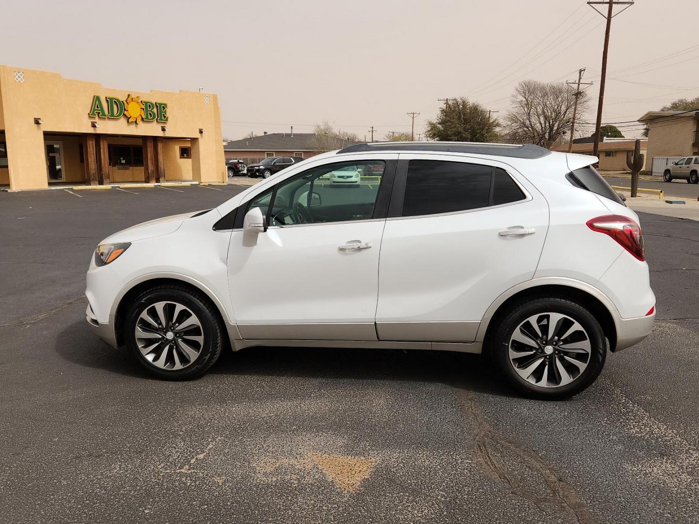 2017 WHITE Buick Encore Preferred II (KL4CJBSB9HB) with an ENGINE, ECOTEC TURBO 1.4L VARIABLE VALVE TIMING DOHC 4-CYLINDER SEQUENTIAL MFI engine, located at 4711 Ave Q, Lubbock, TX, 79412, (806) 687-2362, 33.551304, -101.855293 - Photo#1