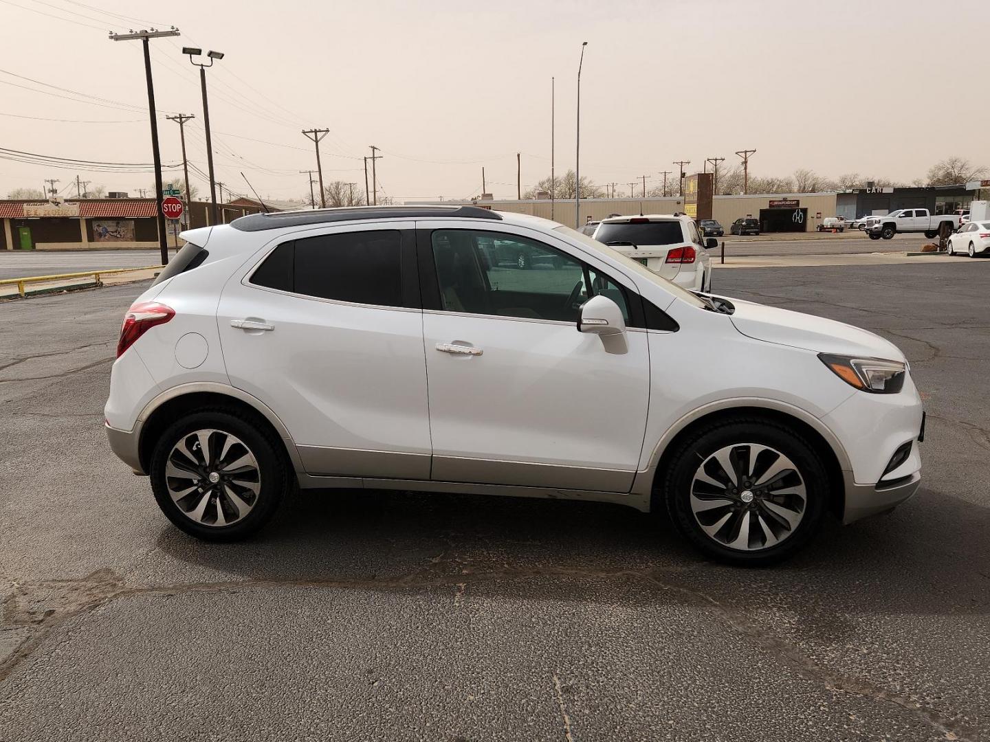 2017 WHITE Buick Encore Preferred II (KL4CJBSB9HB) with an ENGINE, ECOTEC TURBO 1.4L VARIABLE VALVE TIMING DOHC 4-CYLINDER SEQUENTIAL MFI engine, located at 4711 Ave Q, Lubbock, TX, 79412, (806) 687-2362, 33.551304, -101.855293 - Photo#4