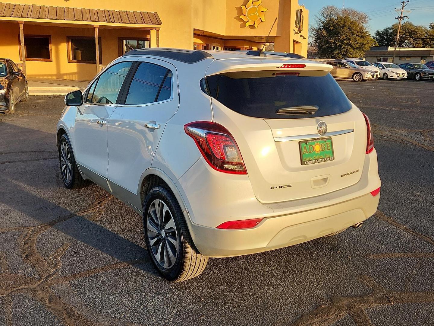 2017 WHITE Buick Encore Preferred II (KL4CJBSB9HB) with an Ecotec 1.4L I-4 DOHC, variable valve control, intercooled turbo, regular unleaded, engine with 138HP engine, located at 4711 Ave Q, Lubbock, TX, 79412, (806) 687-2362, 33.551304, -101.855293 - Photo#2
