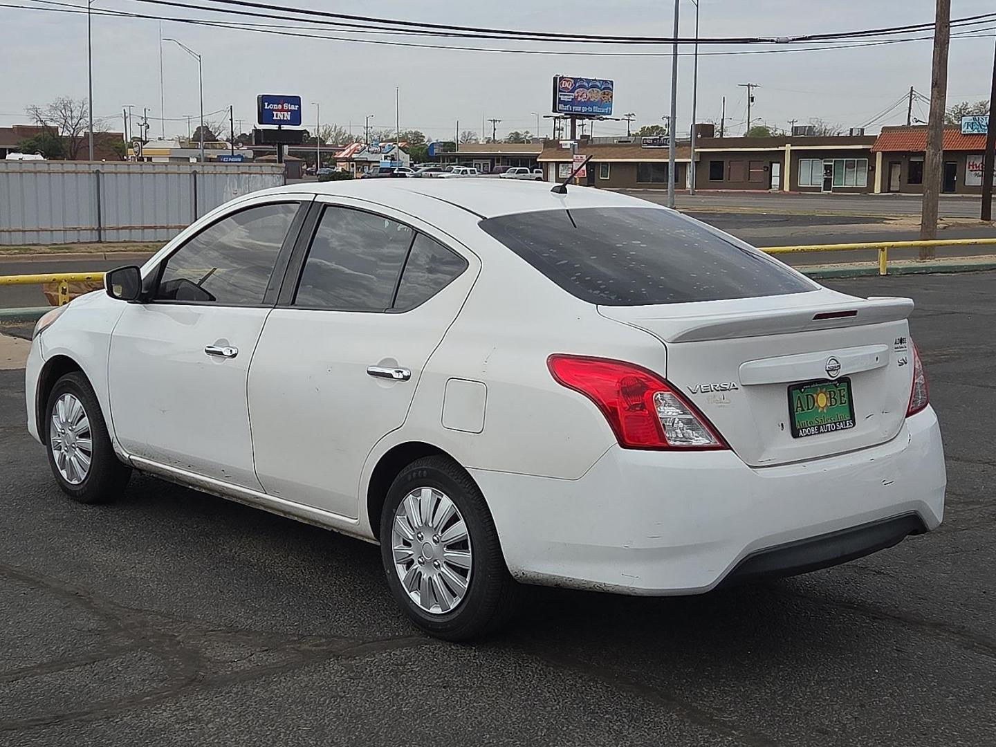 2017 Fresh Powder - QM1 /Charcoal - G Nissan Versa 1.6 S+ (3N1CN7AP7HL) with an 1.6L I-4 DOHC, variable valve control, regular unleaded, engine with 109HP engine, located at 4711 Ave Q, Lubbock, TX, 79412, (806) 687-2362, 33.551304, -101.855293 - Photo#2