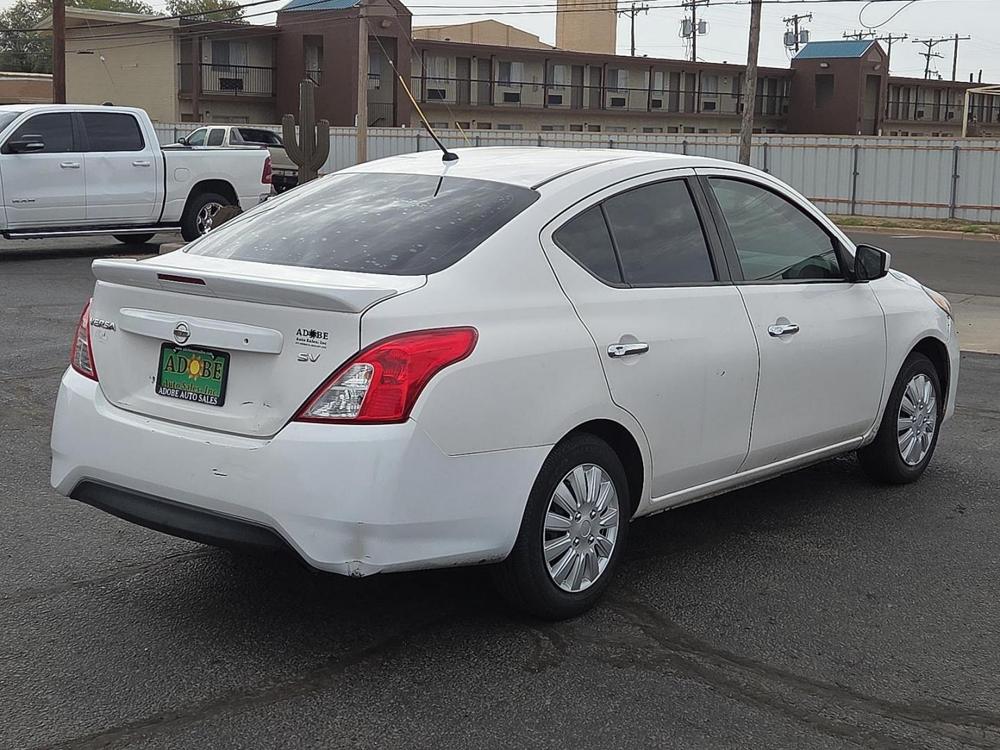 2017 Fresh Powder - QM1 /Charcoal - G Nissan Versa 1.6 S+ (3N1CN7AP7HL) with an 1.6L I-4 DOHC, variable valve control, regular unleaded, engine with 109HP engine, located at 4711 Ave Q, Lubbock, TX, 79412, (806) 687-2362, 33.551304, -101.855293 - Photo#4