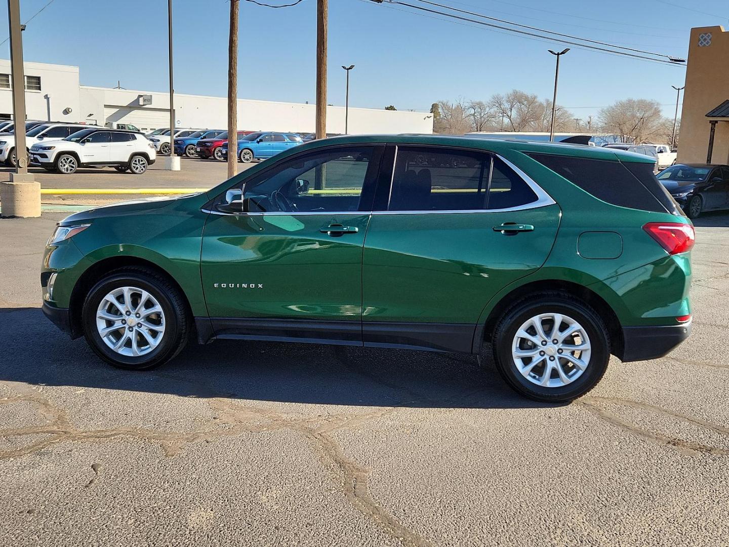 2019 Ivy Metallic Chevrolet Equinox LT (2GNAXKEV0K6) with an ENGINE, 1.5L TURBO DOHC 4-CYLINDER, SIDI, VVT engine, located at 4711 Ave Q, Lubbock, TX, 79412, (806) 687-2362, 33.551304, -101.855293 - Photo#1