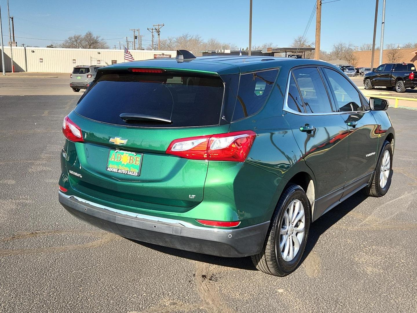2019 Ivy Metallic Chevrolet Equinox LT (2GNAXKEV0K6) with an ENGINE, 1.5L TURBO DOHC 4-CYLINDER, SIDI, VVT engine, located at 4711 Ave Q, Lubbock, TX, 79412, (806) 687-2362, 33.551304, -101.855293 - Photo#3