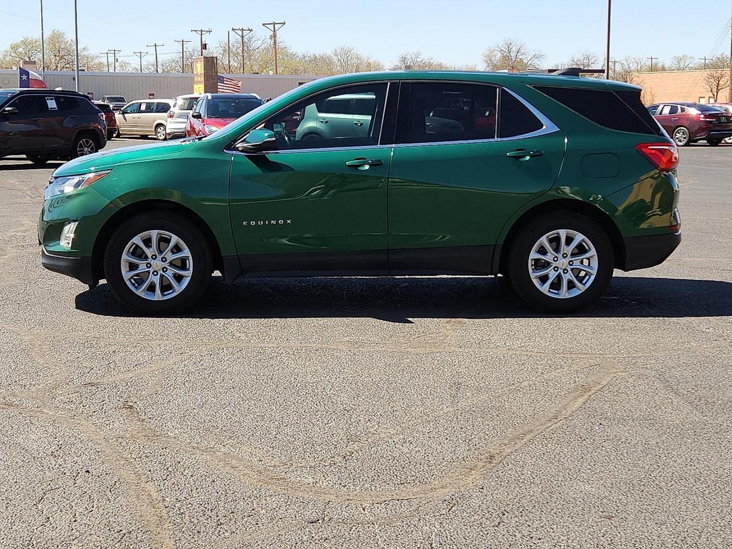 2019 GREEN /Jet Black - H1T Chevrolet Equinox LT (2GNAXKEV0K6) with an 1.5L I-4 gasoline direct injection, DOHC, VVT variable valve control, intercooled turbo, regular unleaded, engine with 170HP engine, located at 4711 Ave Q, Lubbock, TX, 79412, (806) 687-2362, 33.551304, -101.855293 - Photo#2