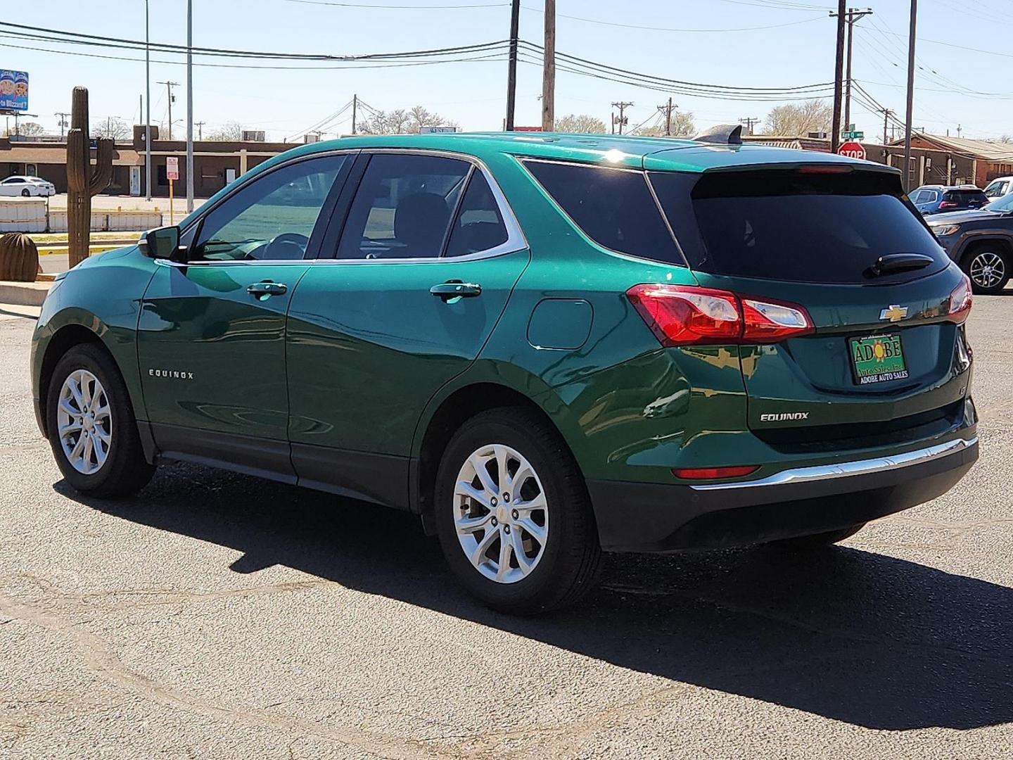 2019 GREEN /Jet Black - H1T Chevrolet Equinox LT (2GNAXKEV0K6) with an 1.5L I-4 gasoline direct injection, DOHC, VVT variable valve control, intercooled turbo, regular unleaded, engine with 170HP engine, located at 4711 Ave Q, Lubbock, TX, 79412, (806) 687-2362, 33.551304, -101.855293 - Photo#3