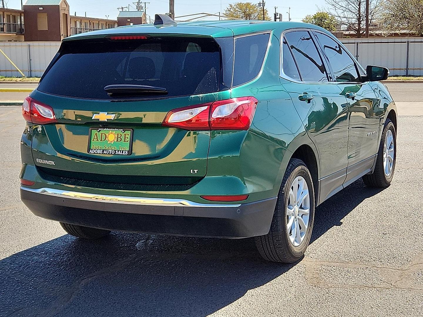 2019 GREEN /Jet Black - H1T Chevrolet Equinox LT (2GNAXKEV0K6) with an 1.5L I-4 gasoline direct injection, DOHC, VVT variable valve control, intercooled turbo, regular unleaded, engine with 170HP engine, located at 4711 Ave Q, Lubbock, TX, 79412, (806) 687-2362, 33.551304, -101.855293 - Photo#4