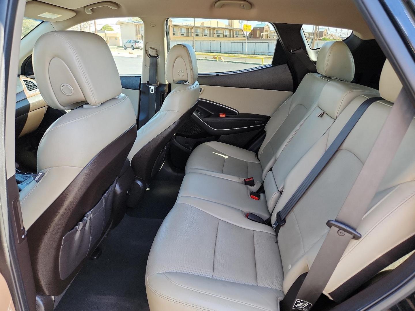 2018 Twilight Black Hyundai Santa Fe Sport 2.0T (5XYZU4LA5JG) with an Engine: 2.0L Turbo-GDI DOHC 16-Valve I4 engine, located at 4711 Ave Q, Lubbock, TX, 79412, (806) 687-2362, 33.551304, -101.855293 - Photo#7
