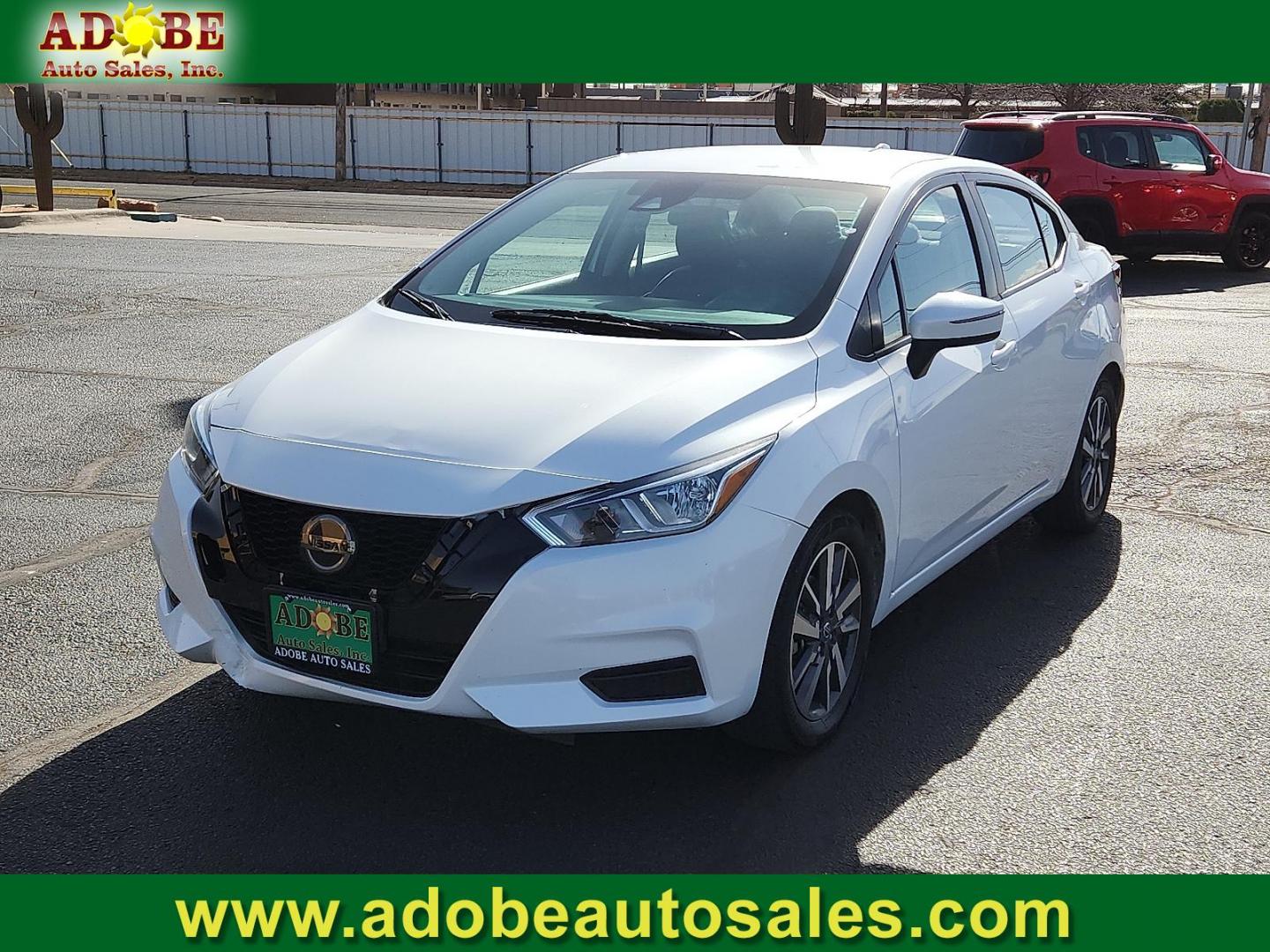 2020 WHITE Nissan Versa SV Xtronic CVT (3N1CN8EV9LL) with an 1.6L I-4 DOHC, variable valve control, regular unleaded, engine with 122HP engine, located at 4711 Ave Q, Lubbock, TX, 79412, (806) 687-2362, 33.551304, -101.855293 - Photo#0