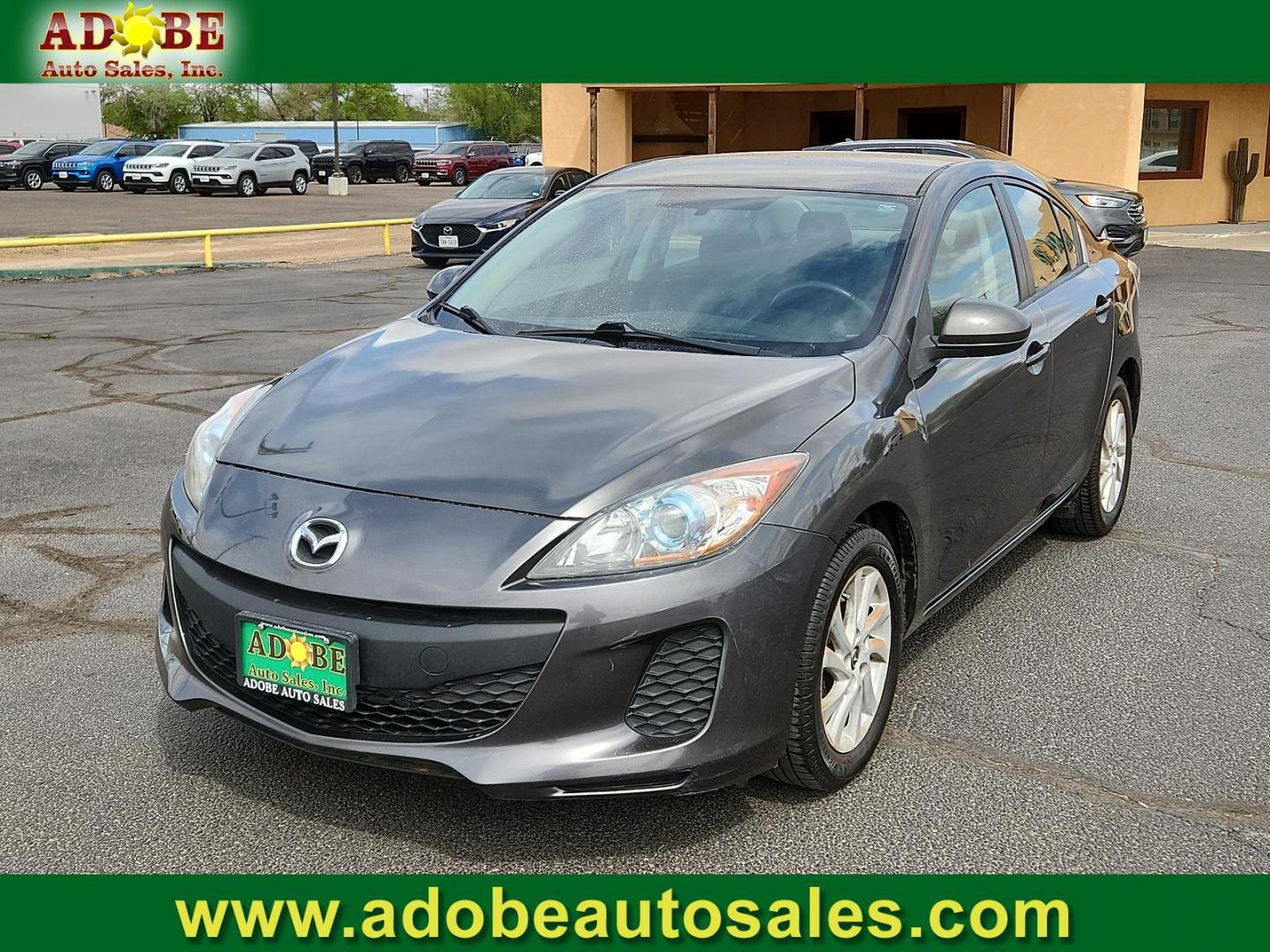 2013 Graphite Mica - 38R /Black - BU4 Mazda Mazda3 i Touring (JM1BL1V85D1) with an 2.0L DOHC 16-valve SKYACTIV-G I4 engine -inc: variable valve timing (VVT) engine, located at 4711 Ave Q, Lubbock, TX, 79412, (806) 687-2362, 33.551304, -101.855293 - Photo#0
