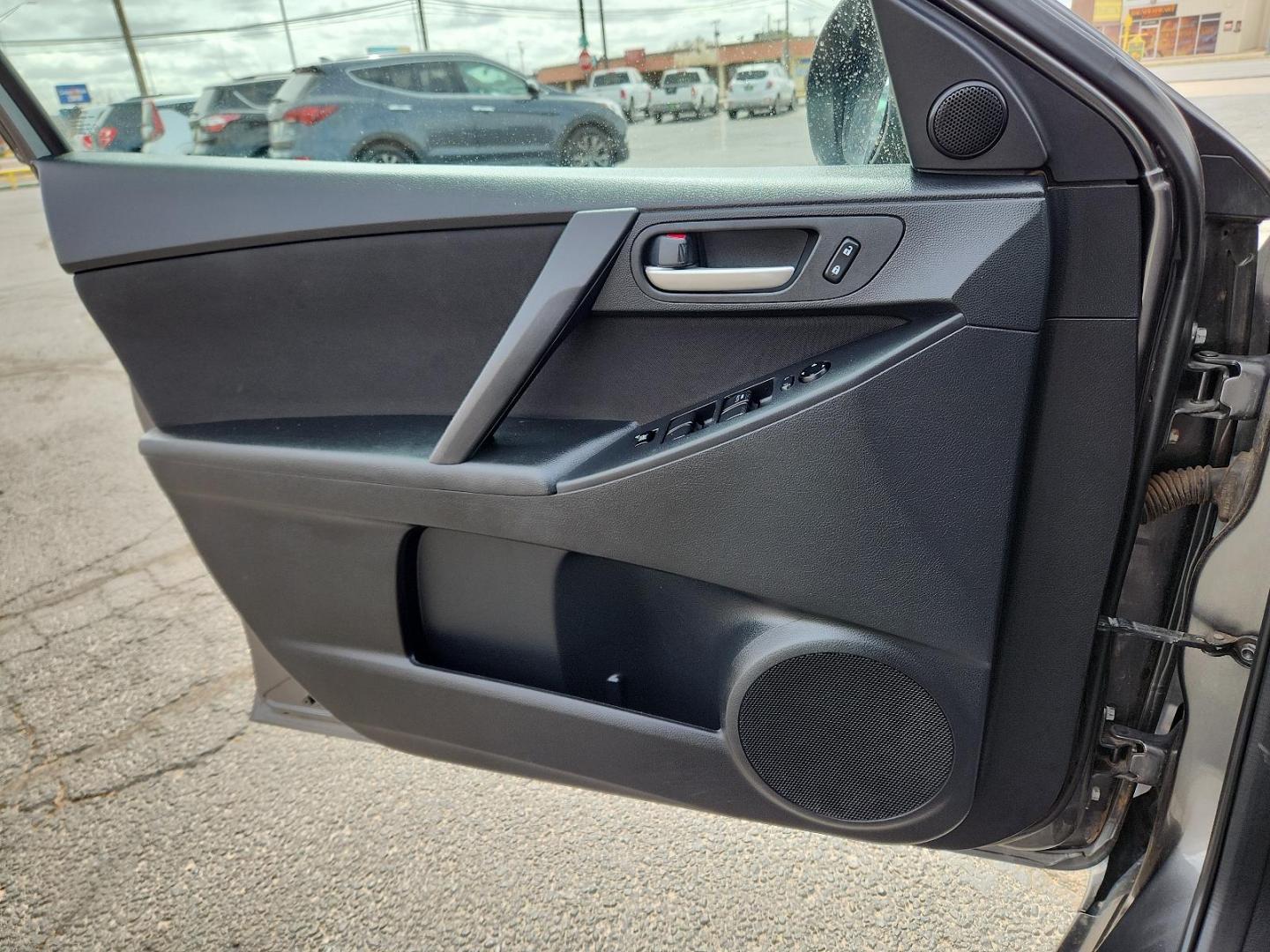 2013 Graphite Mica - 38R /Black - BU4 Mazda Mazda3 i Touring (JM1BL1V85D1) with an 2.0L DOHC 16-valve SKYACTIV-G I4 engine -inc: variable valve timing (VVT) engine, located at 4711 Ave Q, Lubbock, TX, 79412, (806) 687-2362, 33.551304, -101.855293 - Photo#11