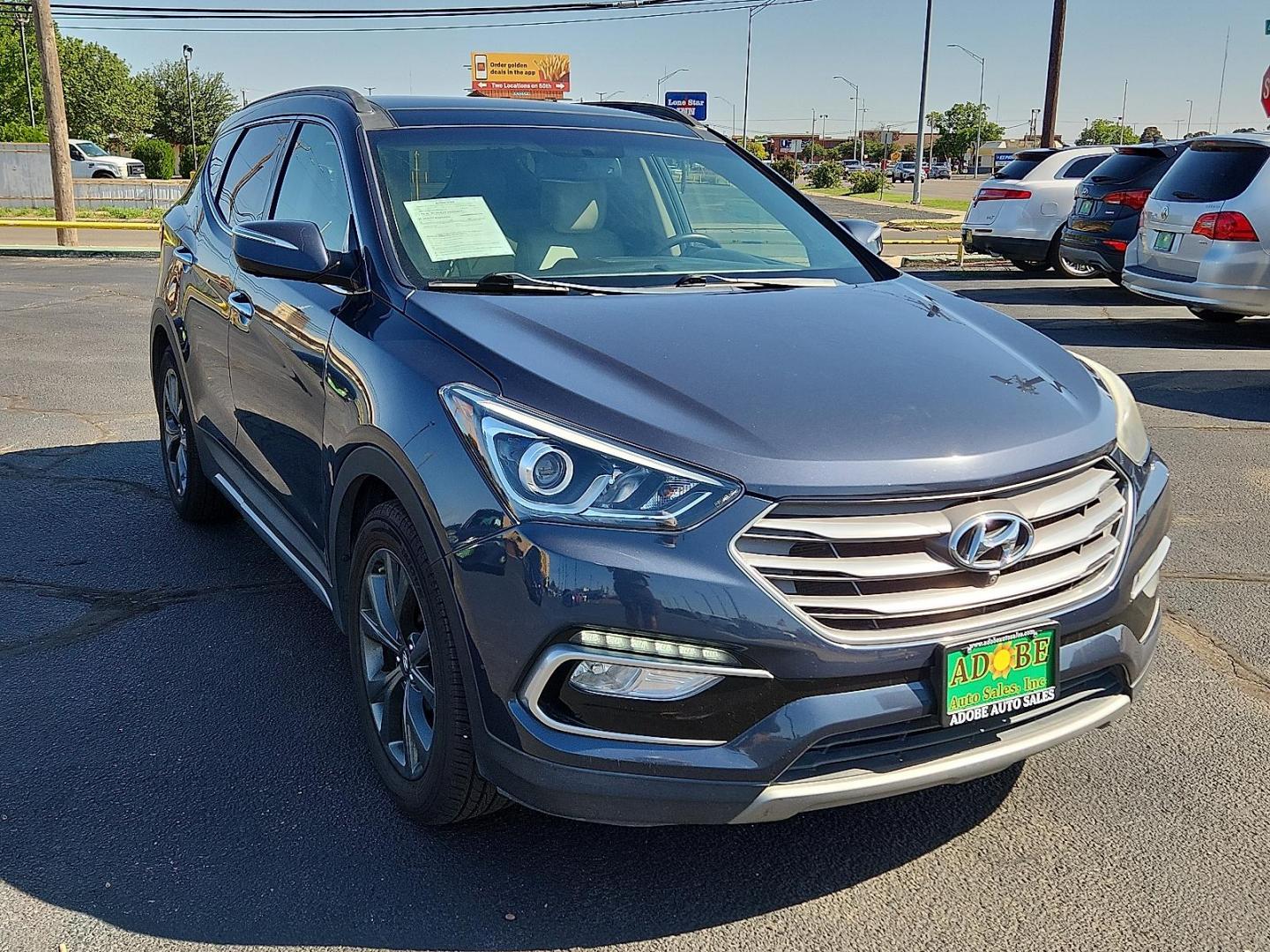 2017 Marlin Blue - W7U /Beige - VYN Hyundai Santa Fe Sport 2.0T Ultimate (5NMZW4LA7HH) with an Engine: 2.0L Turbo-GDI DOHC 16-Valve I4 engine, located at 4711 Ave Q, Lubbock, TX, 79412, (806) 687-2362, 33.551304, -101.855293 - Photo#5