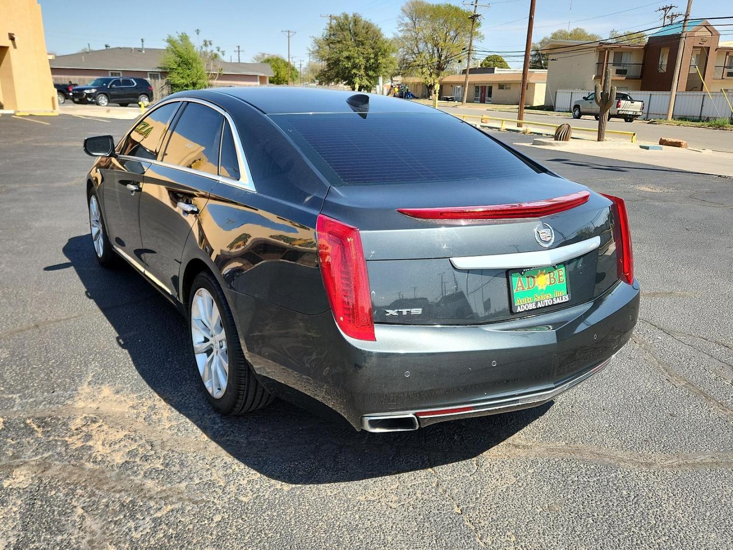 2015 Graphite Metallic - GLJ /Jet Black - AFC Cadillac XTS Luxury (2G61M5S33F9) with an ENGINE, 3.6L SIDI DOHC V6 VVT engine, located at 4711 Ave Q, Lubbock, TX, 79412, (806) 687-2362, 33.551304, -101.855293 - Photo#2