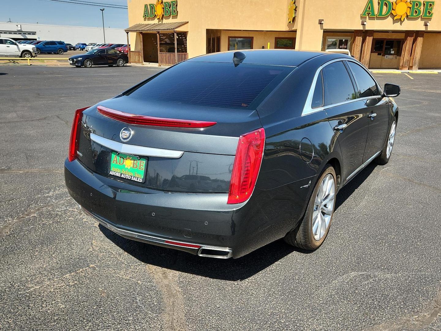 2015 Graphite Metallic - GLJ /Jet Black - AFC Cadillac XTS Luxury (2G61M5S33F9) with an ENGINE, 3.6L SIDI DOHC V6 VVT engine, located at 4711 Ave Q, Lubbock, TX, 79412, (806) 687-2362, 33.551304, -101.855293 - Photo#3