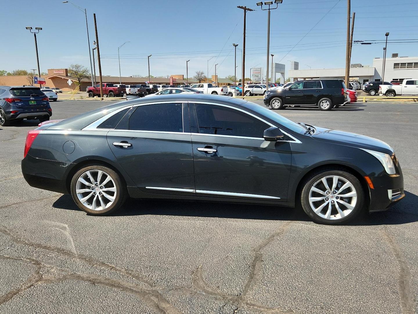 2015 Graphite Metallic - GLJ /Jet Black - AFC Cadillac XTS Luxury (2G61M5S33F9) with an ENGINE, 3.6L SIDI DOHC V6 VVT engine, located at 4711 Ave Q, Lubbock, TX, 79412, (806) 687-2362, 33.551304, -101.855293 - Photo#4