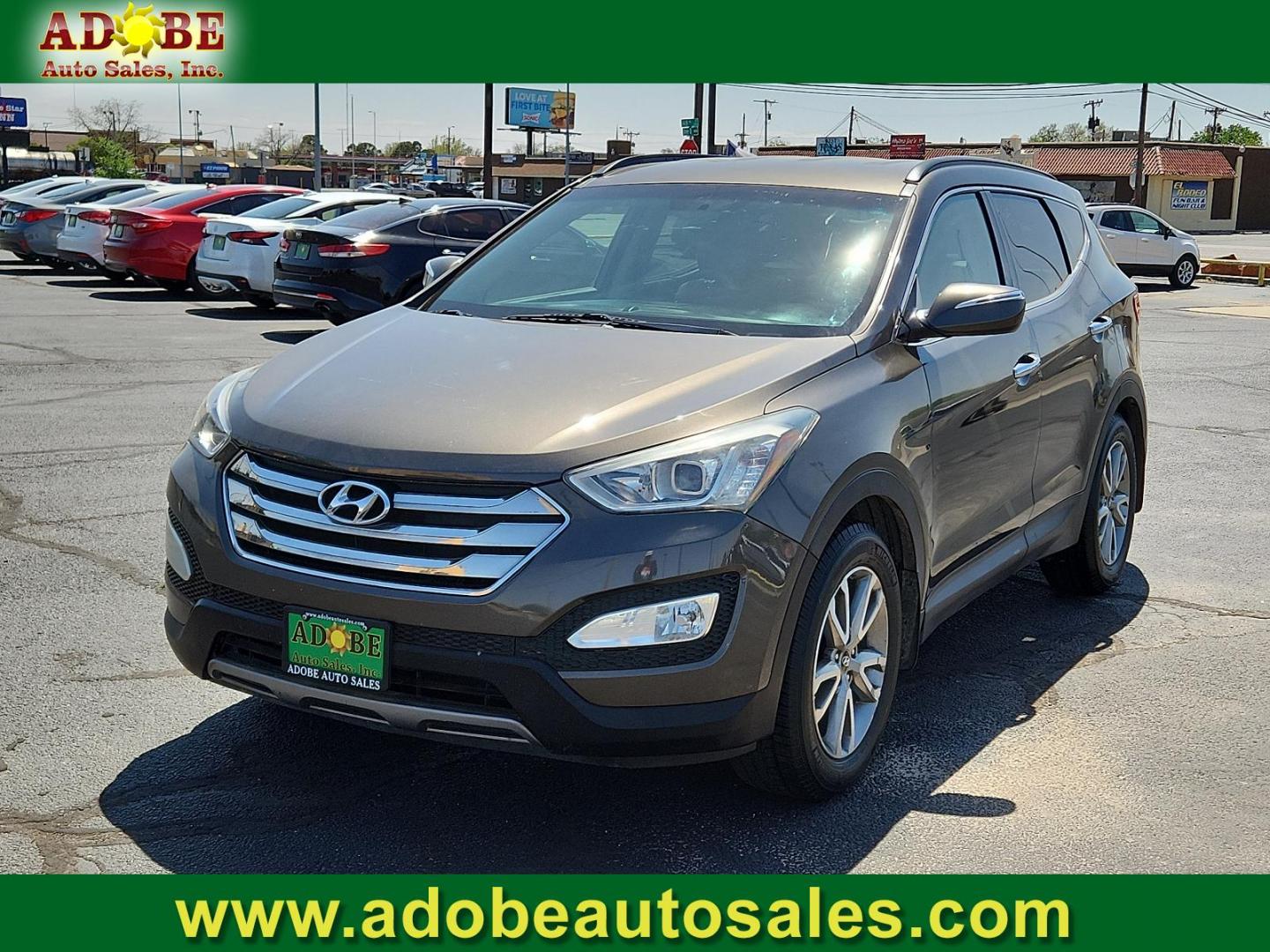2014 Cabo Bronze - D0 /Beige - VYN Hyundai Santa Fe Sport 2.0L Turbo (5XYZU3LA3EG) with an Engine: 2.0L Turbo-GDI DOHC 16-Valve I4 engine, located at 4711 Ave Q, Lubbock, TX, 79412, (806) 687-2362, 33.551304, -101.855293 - Photo#0
