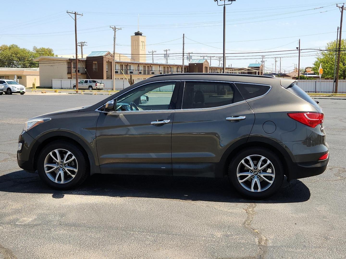 2014 Cabo Bronze - D0 /Beige - VYN Hyundai Santa Fe Sport 2.0L Turbo (5XYZU3LA3EG) with an Engine: 2.0L Turbo-GDI DOHC 16-Valve I4 engine, located at 4711 Ave Q, Lubbock, TX, 79412, (806) 687-2362, 33.551304, -101.855293 - Photo#1