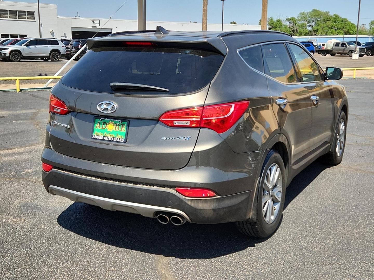 2014 Cabo Bronze - D0 /Beige - VYN Hyundai Santa Fe Sport 2.0L Turbo (5XYZU3LA3EG) with an Engine: 2.0L Turbo-GDI DOHC 16-Valve I4 engine, located at 4711 Ave Q, Lubbock, TX, 79412, (806) 687-2362, 33.551304, -101.855293 - Photo#3