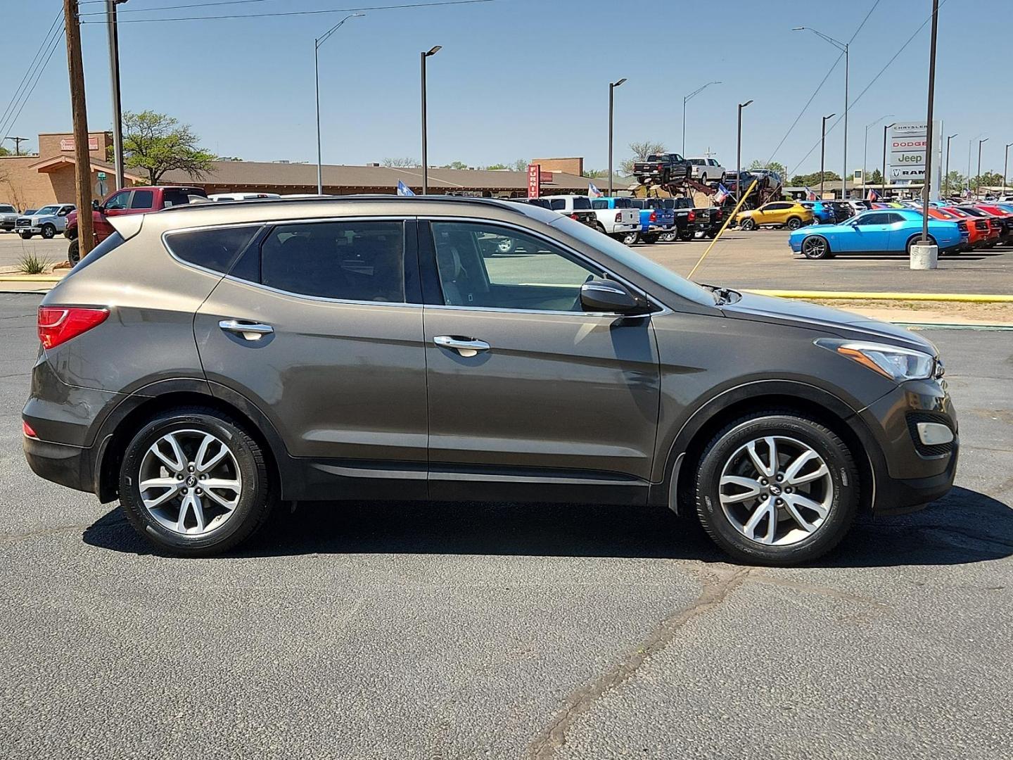 2014 Cabo Bronze - D0 /Beige - VYN Hyundai Santa Fe Sport 2.0L Turbo (5XYZU3LA3EG) with an Engine: 2.0L Turbo-GDI DOHC 16-Valve I4 engine, located at 4711 Ave Q, Lubbock, TX, 79412, (806) 687-2362, 33.551304, -101.855293 - Photo#4