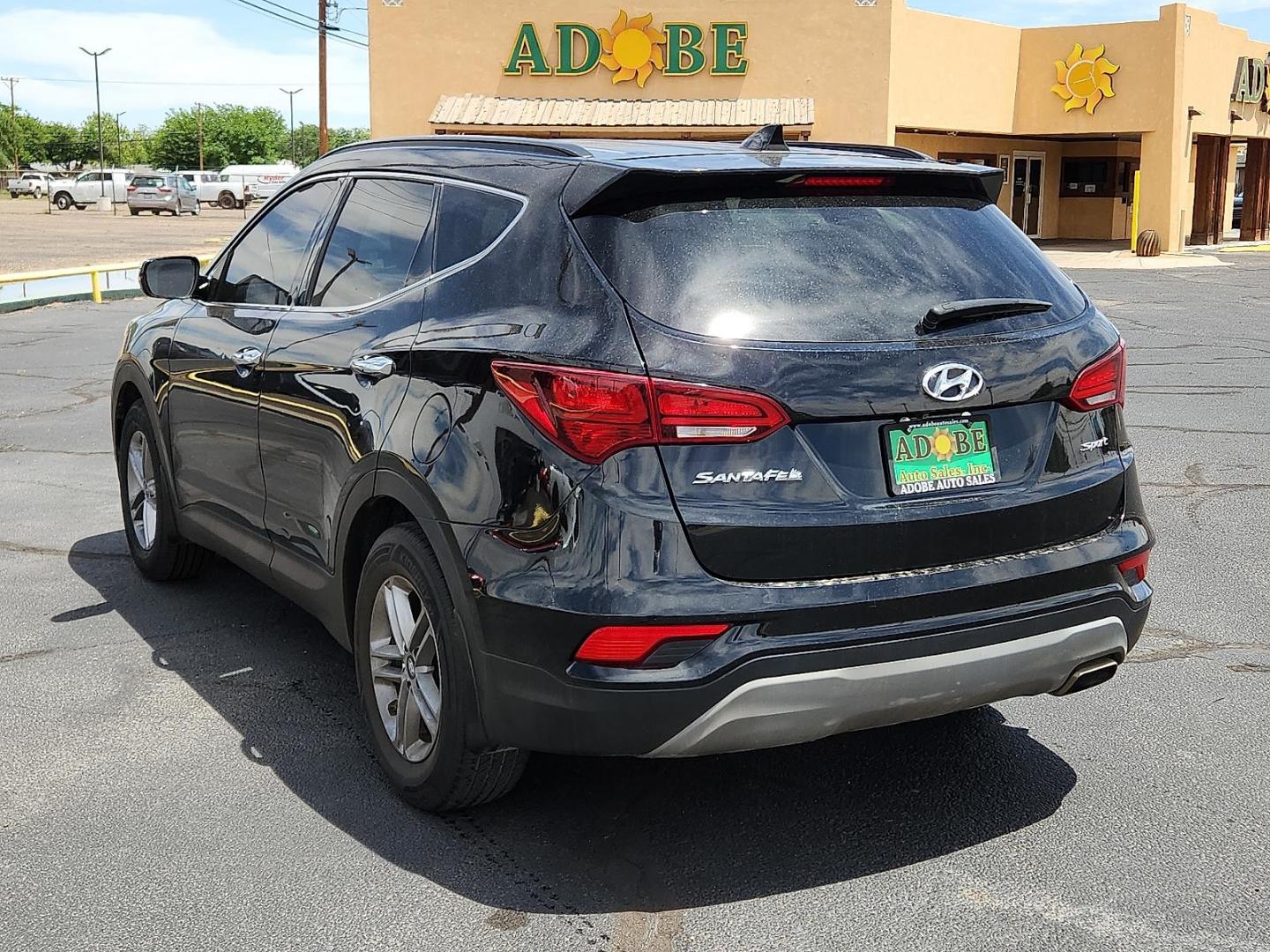 2018 Twilight Black - S3B /Gray - VFG Hyundai Santa Fe Sport 2.4L (5NMZU3LB5JH) with an Theta II 2.4L I-4 gasoline direct injection, DOHC, D-CVVT variable valve control, regular unleaded, engine with 185HP engine, located at 4711 Ave Q, Lubbock, TX, 79412, (806) 687-2362, 33.551304, -101.855293 - Photo#2