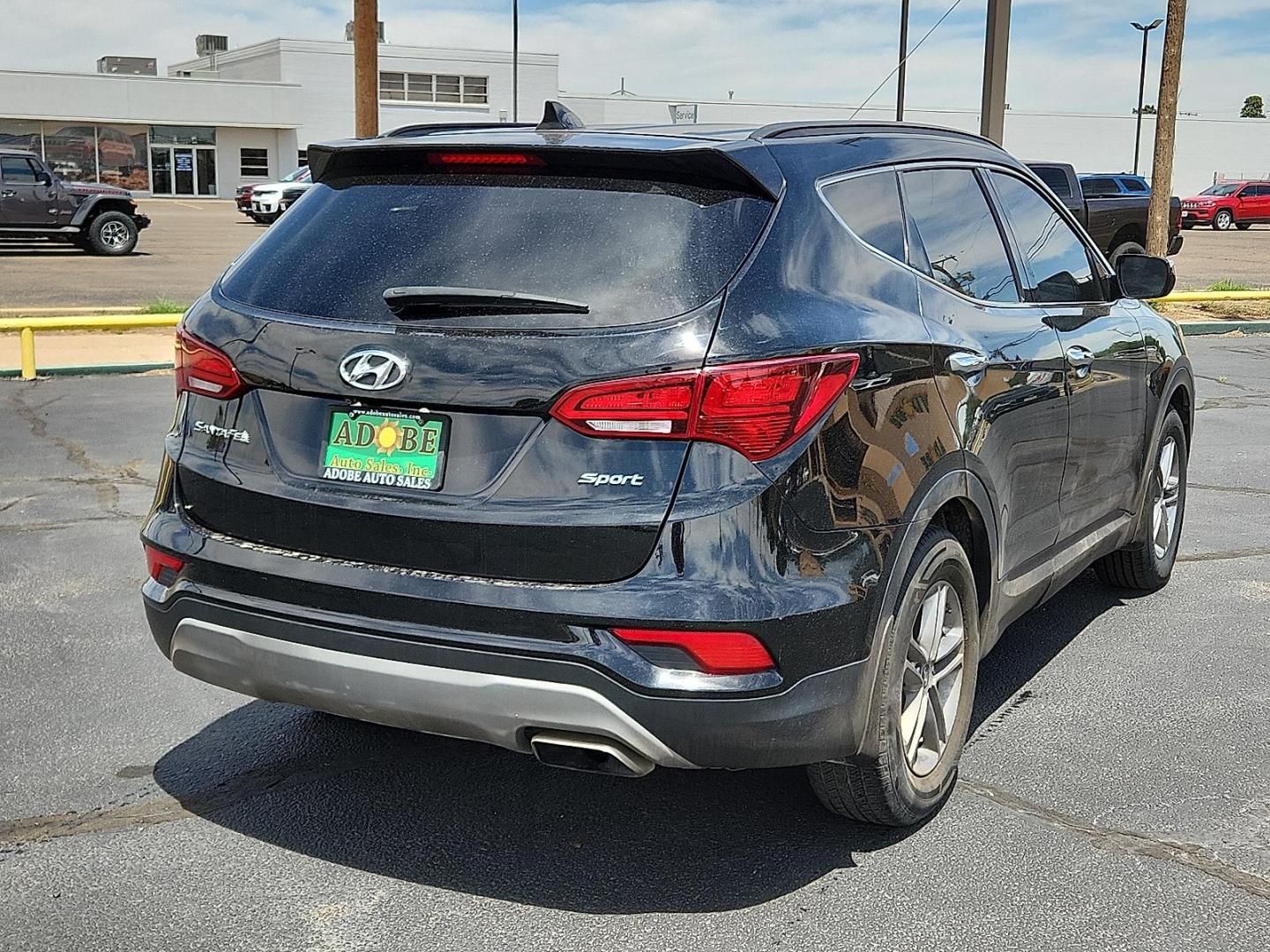 2018 Twilight Black - S3B /Gray - VFG Hyundai Santa Fe Sport 2.4L (5NMZU3LB5JH) with an Theta II 2.4L I-4 gasoline direct injection, DOHC, D-CVVT variable valve control, regular unleaded, engine with 185HP engine, located at 4711 Ave Q, Lubbock, TX, 79412, (806) 687-2362, 33.551304, -101.855293 - Photo#3