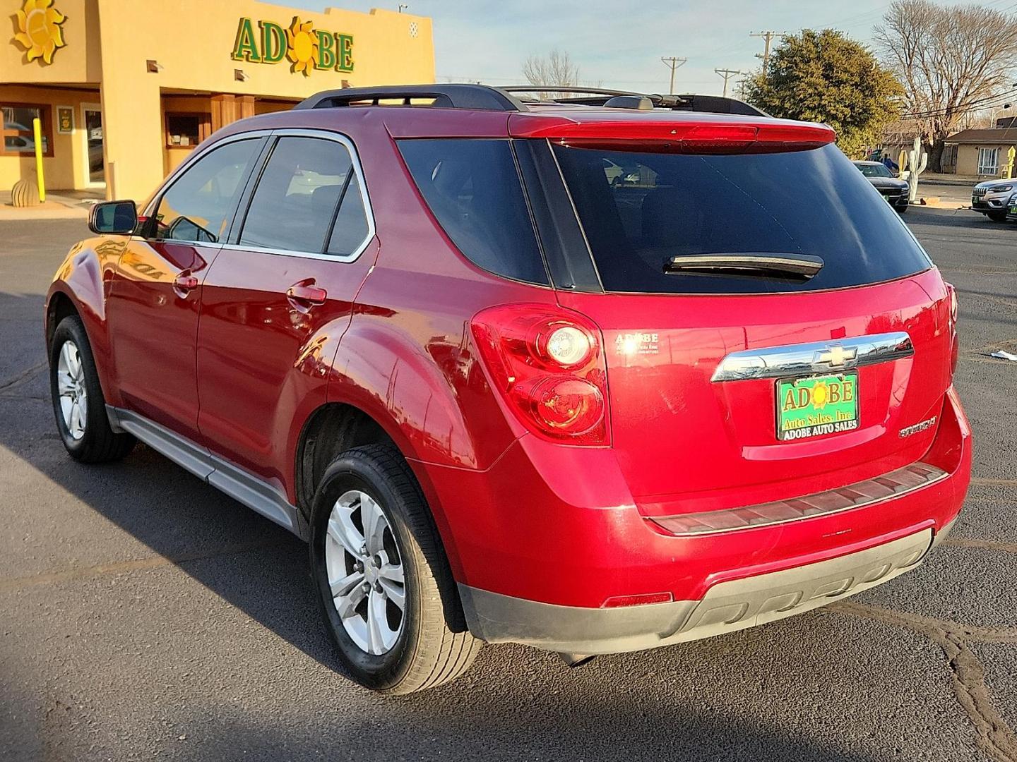 2015 RED Chevrolet Equinox 2LT (1GNALCEK1FZ) with an ECOTEC 2.4L I-4 gasoline direct injection, DOHC, VVT variable valve control, regular unleaded, engine with 182HP engine, located at 4711 Ave Q, Lubbock, TX, 79412, (806) 687-2362, 33.551304, -101.855293 - Photo#2