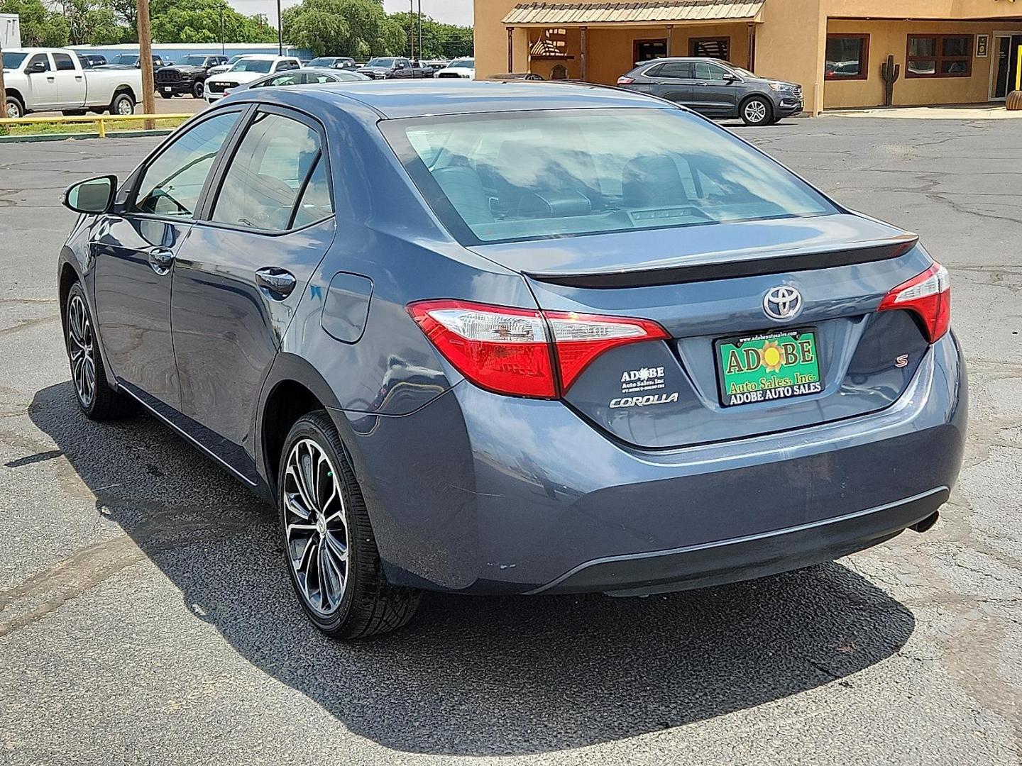 2016 Blue Crush Metallic Toyota Corolla S w/Special Edition Pkg (5YFBURHE7GP) with an 1.8L I-4 DOHC, VVT-i variable valve control, regular unleaded, engine with 132HP engine, located at 4711 Ave Q, Lubbock, TX, 79412, (806) 687-2362, 33.551304, -101.855293 - Photo#2