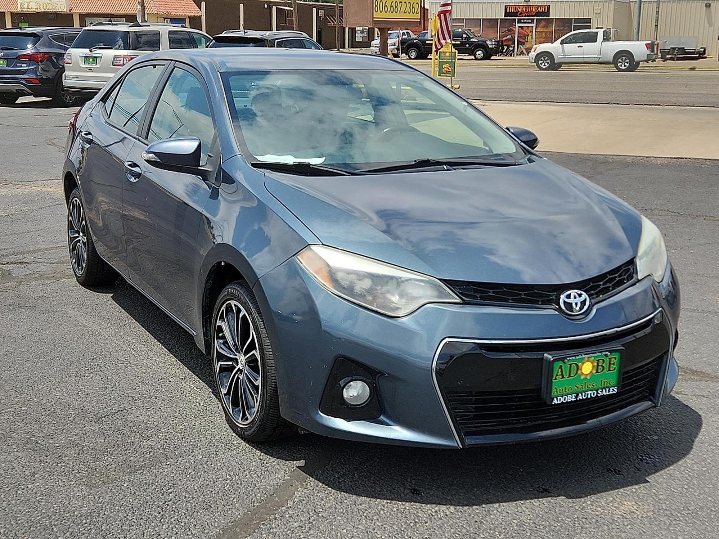2016 Blue Crush Metallic Toyota Corolla S w/Special Edition Pkg (5YFBURHE7GP) with an 1.8L I-4 DOHC, VVT-i variable valve control, regular unleaded, engine with 132HP engine, located at 4711 Ave Q, Lubbock, TX, 79412, (806) 687-2362, 33.551304, -101.855293 - Photo#5