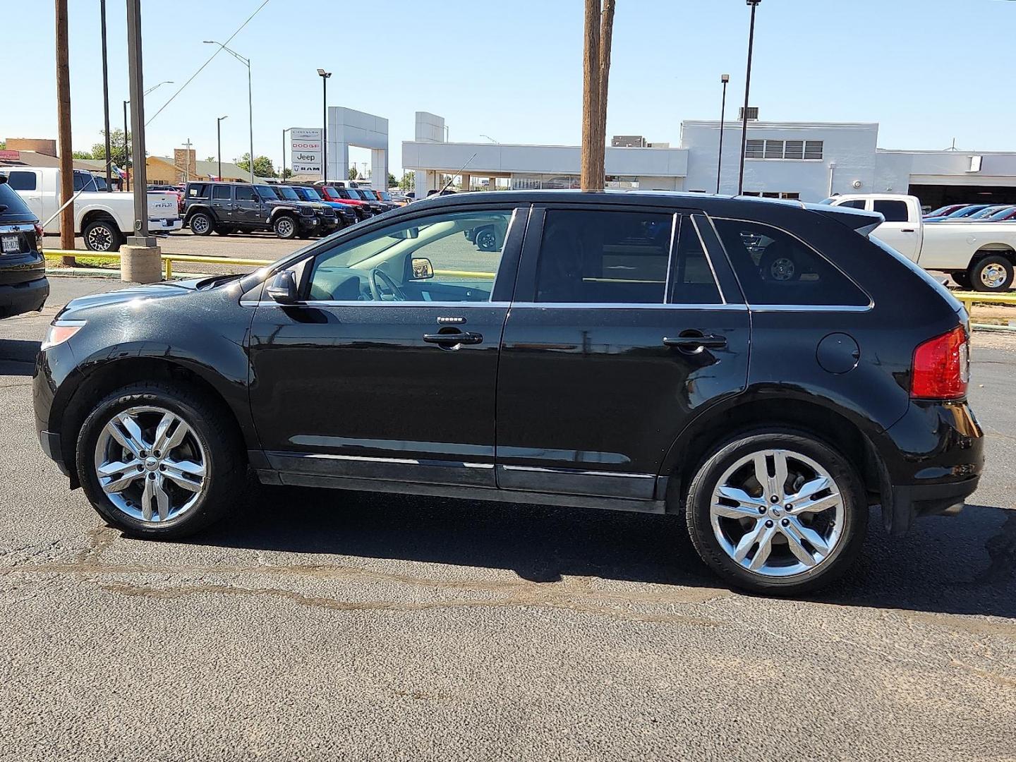 2014 Tuxedo Black Metallic Ford Edge Limited (2FMDK3KC8EB) with an 3.5L V-6 DOHC, variable valve control, regular unleaded, engine with 285HP engine, located at 4711 Ave Q, Lubbock, TX, 79412, (806) 687-2362, 33.551304, -101.855293 - Photo#1