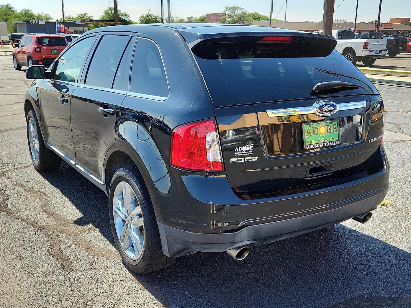 2014 Tuxedo Black Metallic Ford Edge Limited (2FMDK3KC8EB) with an 3.5L V-6 DOHC, variable valve control, regular unleaded, engine with 285HP engine, located at 4711 Ave Q, Lubbock, TX, 79412, (806) 687-2362, 33.551304, -101.855293 - Photo#2