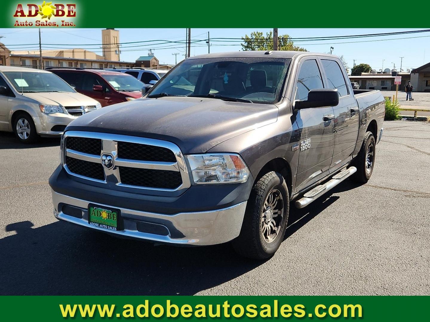 2015 GRAY Ram 1500 Tradesman (3C6RR6KT3FG) with an HEMI 5.7L V-8 variable valve control, regular unleaded, engine with cylinder deactivation and 395HP engine, located at 4711 Ave Q, Lubbock, TX, 79412, (806) 687-2362, 33.551304, -101.855293 - Photo#0