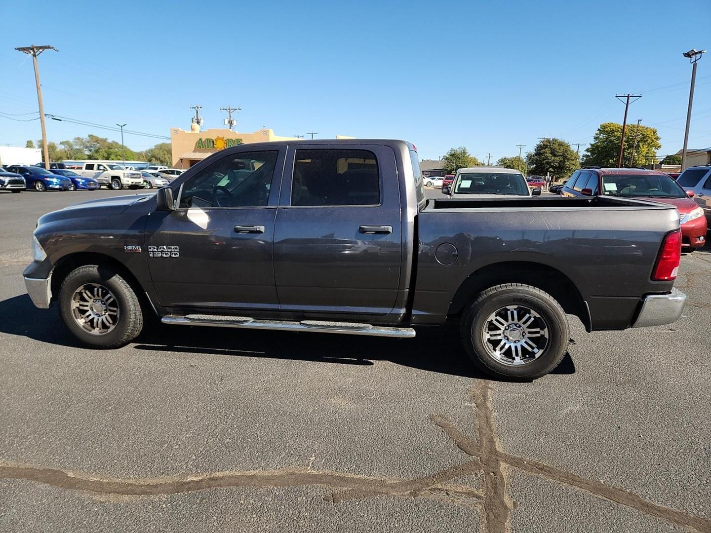 2015 GRAY Ram 1500 Tradesman (3C6RR6KT3FG) with an HEMI 5.7L V-8 variable valve control, regular unleaded, engine with cylinder deactivation and 395HP engine, located at 4711 Ave Q, Lubbock, TX, 79412, (806) 687-2362, 33.551304, -101.855293 - Photo#1