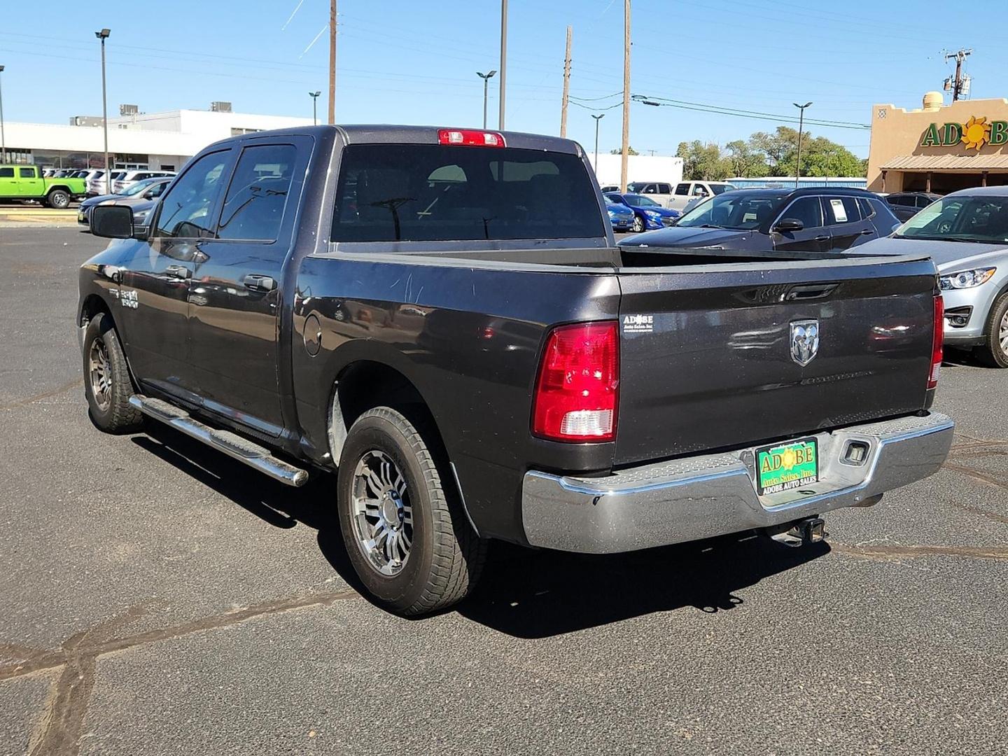 2015 GRAY Ram 1500 Tradesman (3C6RR6KT3FG) with an HEMI 5.7L V-8 variable valve control, regular unleaded, engine with cylinder deactivation and 395HP engine, located at 4711 Ave Q, Lubbock, TX, 79412, (806) 687-2362, 33.551304, -101.855293 - Photo#2