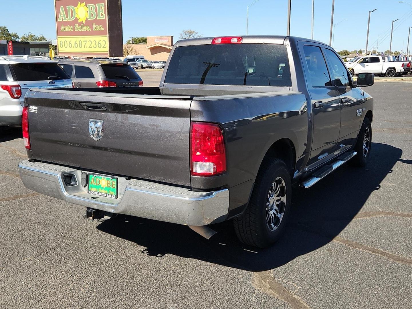 2015 GRAY Ram 1500 Tradesman (3C6RR6KT3FG) with an HEMI 5.7L V-8 variable valve control, regular unleaded, engine with cylinder deactivation and 395HP engine, located at 4711 Ave Q, Lubbock, TX, 79412, (806) 687-2362, 33.551304, -101.855293 - Photo#3