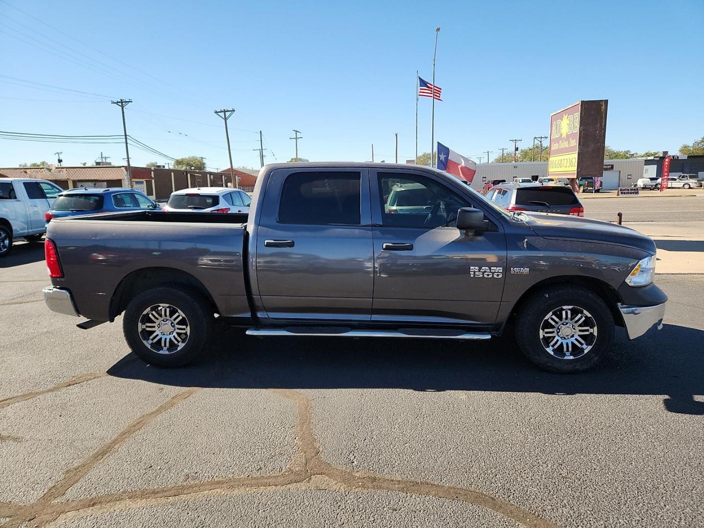 2015 GRAY Ram 1500 Tradesman (3C6RR6KT3FG) with an HEMI 5.7L V-8 variable valve control, regular unleaded, engine with cylinder deactivation and 395HP engine, located at 4711 Ave Q, Lubbock, TX, 79412, (806) 687-2362, 33.551304, -101.855293 - Photo#4