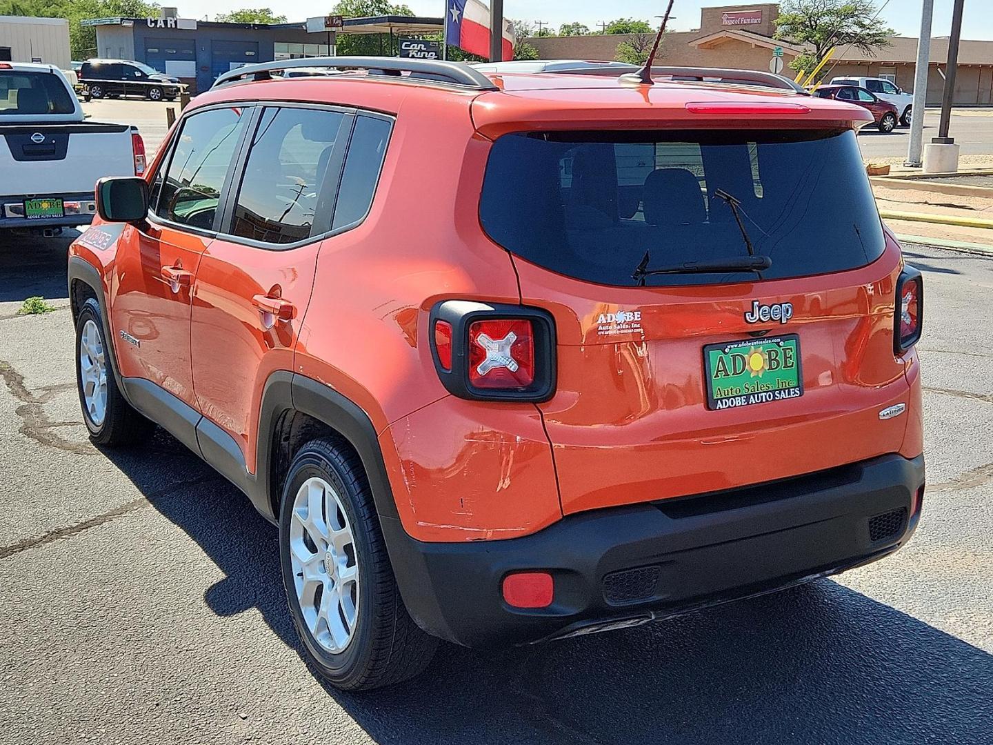 2015 Omaha Orange Jeep Renegade Latitude (ZACCJABT4FP) with an MultiAir2 Tigershark 2.4L I-4 variable valve control, regular unleaded, engine with 180HP engine, located at 4711 Ave Q, Lubbock, TX, 79412, (806) 687-2362, 33.551304, -101.855293 - Photo#2