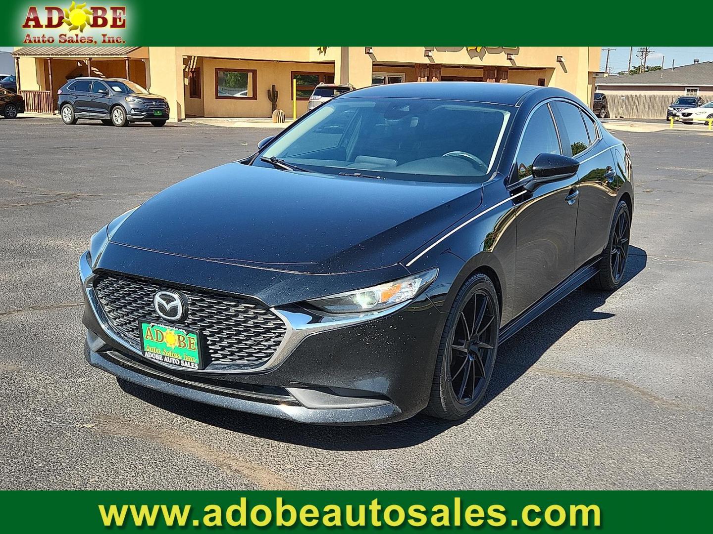 2020 Jet Black Mica Mazda Mazda3 Sedan Select Package (3MZBPBCM8LM) with an SKYACTIV-G 2.5L I-4 gasoline direct injection, DOHC, variable valve control, regular unleaded, engine with cylinder deactivation and 186HP engine, located at 4711 Ave Q, Lubbock, TX, 79412, (806) 687-2362, 33.551304, -101.855293 - Photo#0