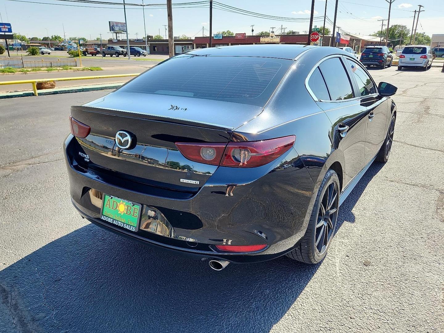 2020 Jet Black Mica Mazda Mazda3 Sedan Select Package (3MZBPBCM8LM) with an SKYACTIV-G 2.5L I-4 gasoline direct injection, DOHC, variable valve control, regular unleaded, engine with cylinder deactivation and 186HP engine, located at 4711 Ave Q, Lubbock, TX, 79412, (806) 687-2362, 33.551304, -101.855293 - Photo#3