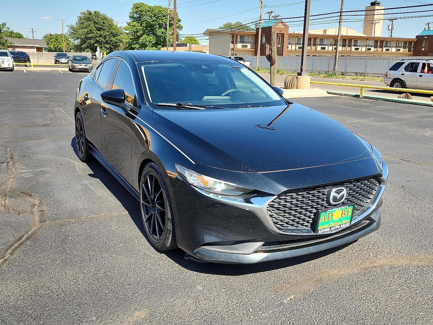 2020 Jet Black Mica Mazda Mazda3 Sedan Select Package (3MZBPBCM8LM) with an SKYACTIV-G 2.5L I-4 gasoline direct injection, DOHC, variable valve control, regular unleaded, engine with cylinder deactivation and 186HP engine, located at 4711 Ave Q, Lubbock, TX, 79412, (806) 687-2362, 33.551304, -101.855293 - Photo#5